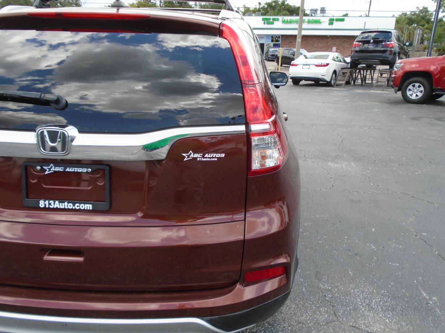 2016 Honda CR-V EX-L 2WD (2HKRM3H79GH) with an 2.4L L4 DOHC 16V engine, CVT transmission, located at 6112 N Florida Avenue, Tampa, FL, 33604, (888) 521-5131, 27.954929, -82.459534 - Photo#9