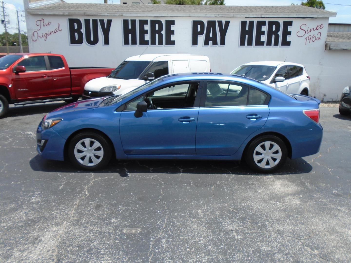 2015 Subaru Impreza 2.0i PZEV CVT 4-Door (JF1GJAA66FH) with an 2.0L H4 DOHC 16V engine, Continuously Variable Transmission transmission, located at 6112 N Florida Avenue, Tampa, FL, 33604, (888) 521-5131, 27.954929, -82.459534 - $499 down plus tax & tag. - Photo#1