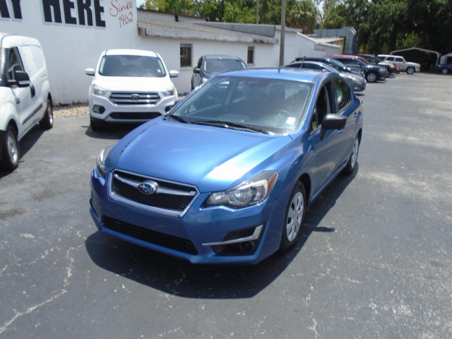2015 Subaru Impreza 2.0i PZEV CVT 4-Door (JF1GJAA66FH) with an 2.0L H4 DOHC 16V engine, Continuously Variable Transmission transmission, located at 6112 N Florida Avenue, Tampa, FL, 33604, (888) 521-5131, 27.954929, -82.459534 - Photo#3