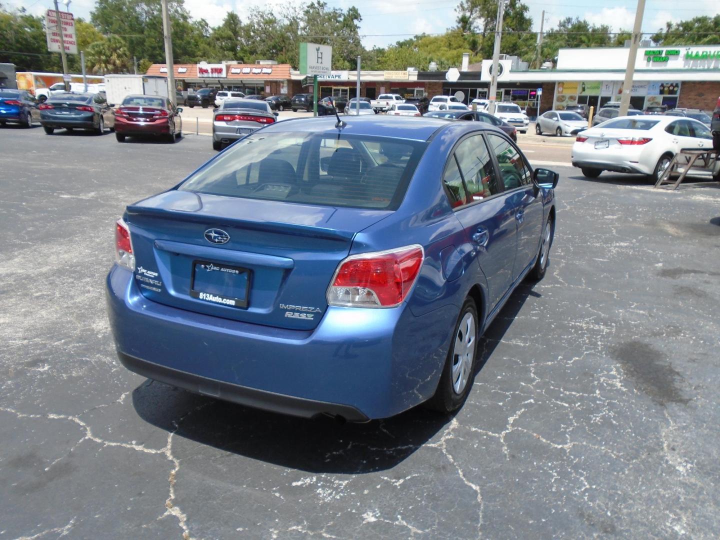 2015 Subaru Impreza 2.0i PZEV CVT 4-Door (JF1GJAA66FH) with an 2.0L H4 DOHC 16V engine, Continuously Variable Transmission transmission, located at 6112 N Florida Avenue, Tampa, FL, 33604, (888) 521-5131, 27.954929, -82.459534 - Photo#5