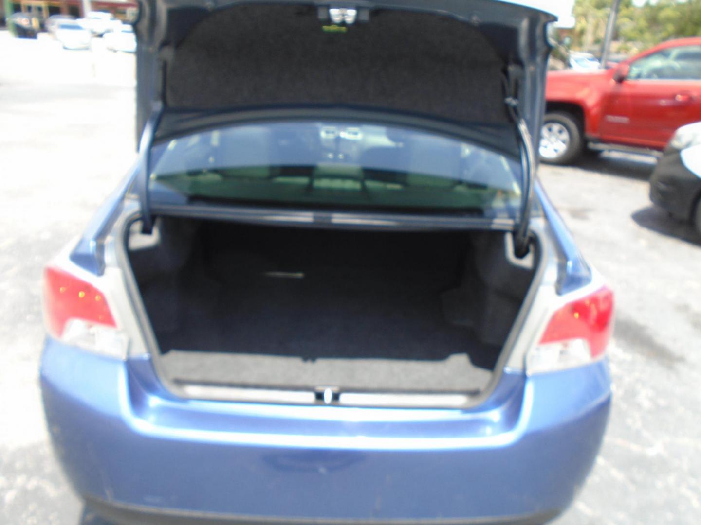2015 Subaru Impreza 2.0i PZEV CVT 4-Door (JF1GJAA66FH) with an 2.0L H4 DOHC 16V engine, Continuously Variable Transmission transmission, located at 6112 N Florida Avenue, Tampa, FL, 33604, (888) 521-5131, 27.954929, -82.459534 - Photo#6