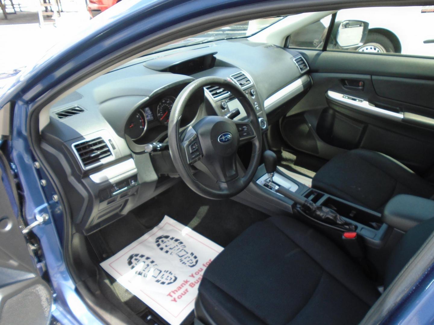 2015 Subaru Impreza 2.0i PZEV CVT 4-Door (JF1GJAA66FH) with an 2.0L H4 DOHC 16V engine, Continuously Variable Transmission transmission, located at 6112 N Florida Avenue, Tampa, FL, 33604, (888) 521-5131, 27.954929, -82.459534 - Photo#9