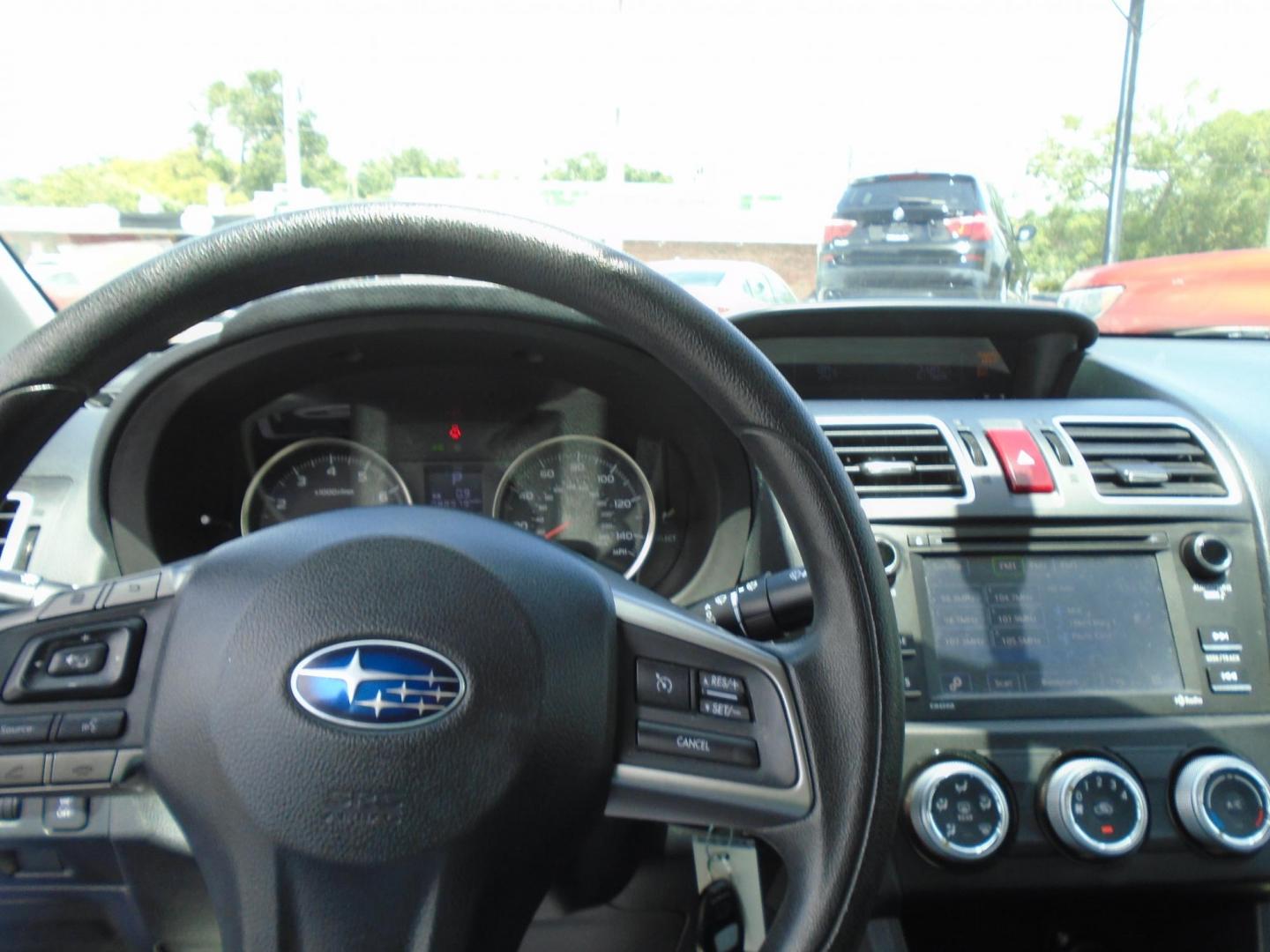 2015 Subaru Impreza 2.0i PZEV CVT 4-Door (JF1GJAA66FH) with an 2.0L H4 DOHC 16V engine, Continuously Variable Transmission transmission, located at 6112 N Florida Avenue, Tampa, FL, 33604, (888) 521-5131, 27.954929, -82.459534 - Photo#12