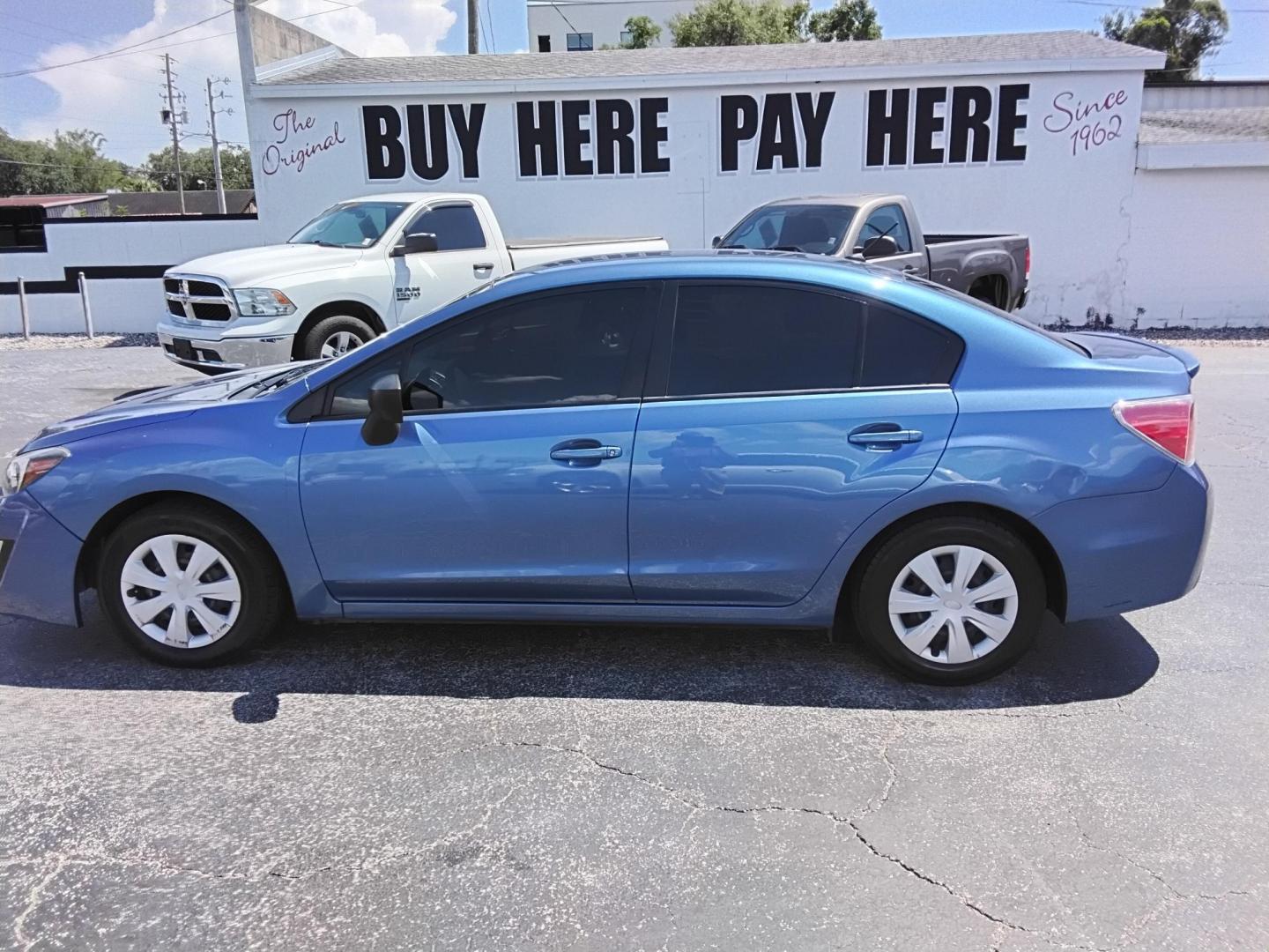 2015 Subaru Impreza 2.0i PZEV CVT 4-Door (JF1GJAA66FH) with an 2.0L H4 DOHC 16V engine, Continuously Variable Transmission transmission, located at 6112 N Florida Avenue, Tampa, FL, 33604, (888) 521-5131, 27.954929, -82.459534 - $499 down plus tax & tag. - Photo#0