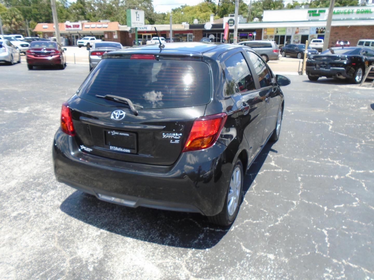 2015 Toyota Yaris LE 5-Door AT (VNKKTUD34FA) with an 1.5L L4 DOHC 16V engine, 4-Speed Automatic transmission, located at 6112 N Florida Avenue, Tampa, FL, 33604, (888) 521-5131, 27.954929, -82.459534 - Photo#4