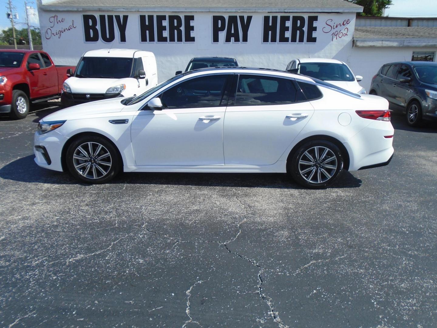 2019 Kia Optima EX (5XXGU4L13KG) with an 1.6L L4 DOHC 16V engine, 6A transmission, located at 6112 N Florida Avenue, Tampa, FL, 33604, (888) 521-5131, 27.954929, -82.459534 - Photo#0
