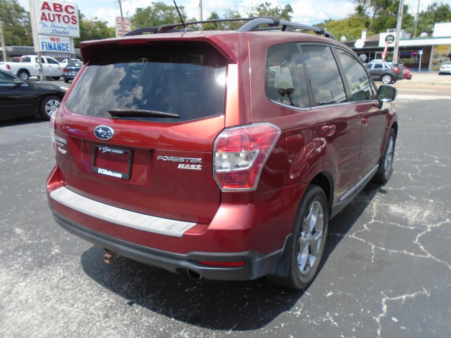 2015 Subaru Forester 2.5i Touring (JF2SJAUC7FH) with an 2.5L H4 SOHC 16V engine, 6-Speed Automatic transmission, located at 6112 N Florida Avenue, Tampa, FL, 33604, (888) 521-5131, 27.954929, -82.459534 - Photo#5