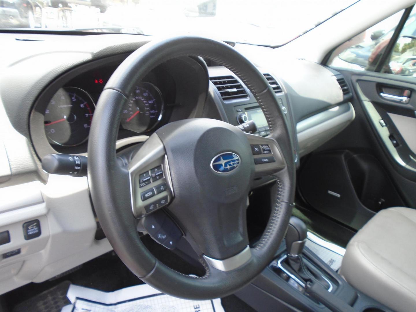 2015 Subaru Forester 2.5i Touring (JF2SJAUC7FH) with an 2.5L H4 SOHC 16V engine, 6-Speed Automatic transmission, located at 6112 N Florida Avenue, Tampa, FL, 33604, (888) 521-5131, 27.954929, -82.459534 - Photo#9