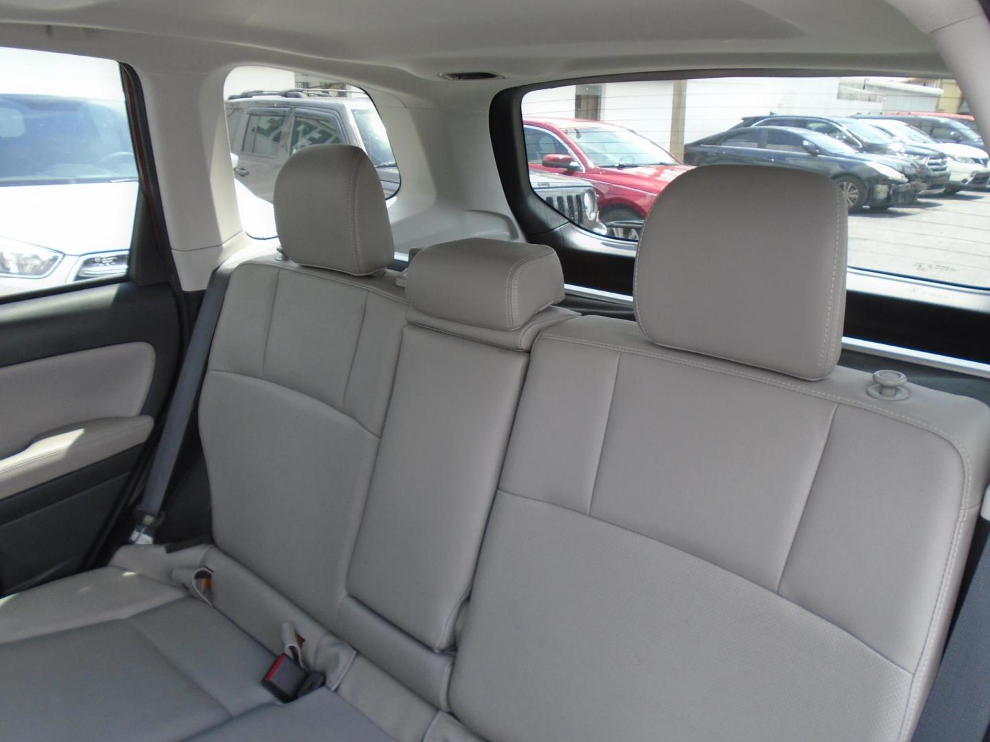 2015 Subaru Forester 2.5i Touring (JF2SJAUC7FH) with an 2.5L H4 SOHC 16V engine, 6-Speed Automatic transmission, located at 6112 N Florida Avenue, Tampa, FL, 33604, (888) 521-5131, 27.954929, -82.459534 - Photo#12