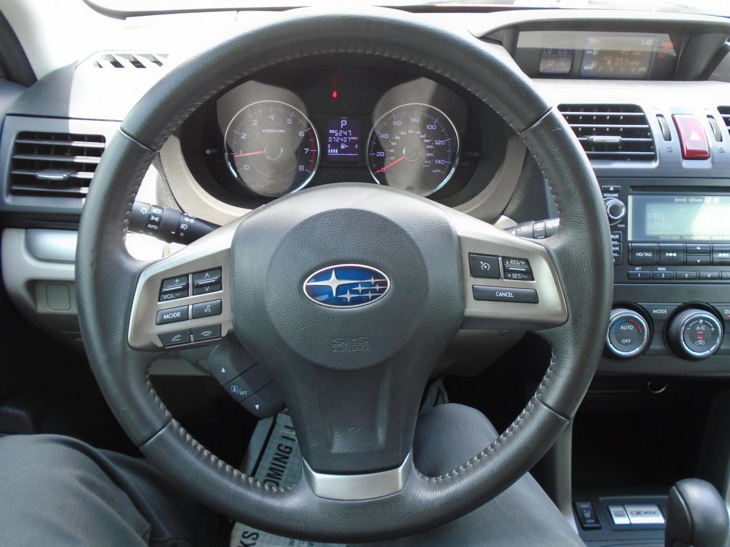 2015 Subaru Forester 2.5i Touring (JF2SJAUC7FH) with an 2.5L H4 SOHC 16V engine, 6-Speed Automatic transmission, located at 6112 N Florida Avenue, Tampa, FL, 33604, (888) 521-5131, 27.954929, -82.459534 - Photo#13