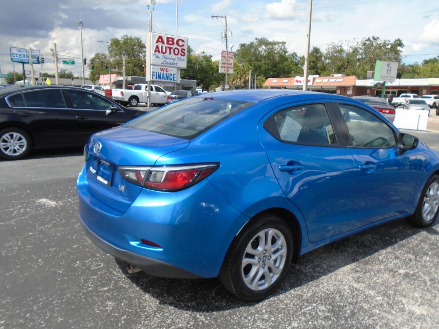 2016 Scion iA 6A (3MYDLBZVXGY) with an 1.5L L4 DOHC 16V engine, 6A transmission, located at 6112 N Florida Avenue, Tampa, FL, 33604, (888) 521-5131, 27.954929, -82.459534 - Photo#4