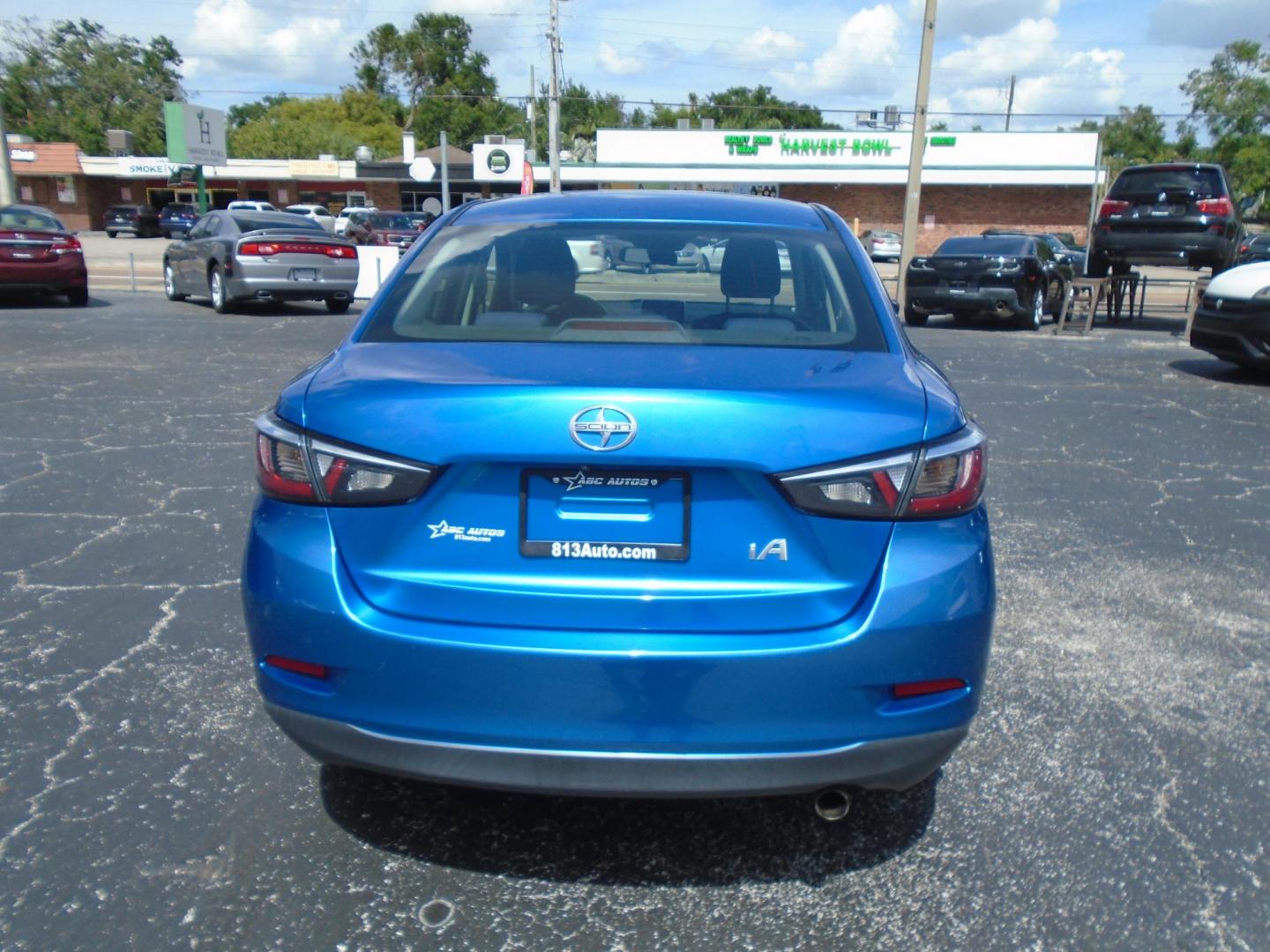 2016 Scion iA 6A (3MYDLBZVXGY) with an 1.5L L4 DOHC 16V engine, 6A transmission, located at 6112 N Florida Avenue, Tampa, FL, 33604, (888) 521-5131, 27.954929, -82.459534 - Photo#3