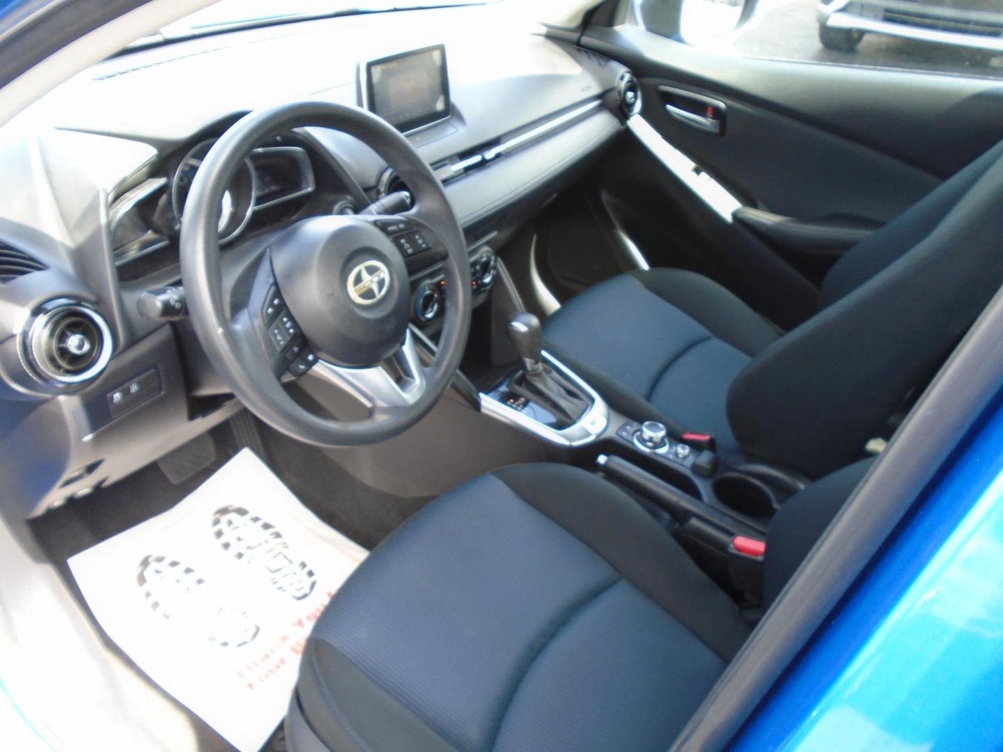 2016 Scion iA 6A (3MYDLBZVXGY) with an 1.5L L4 DOHC 16V engine, 6A transmission, located at 6112 N Florida Avenue, Tampa, FL, 33604, (888) 521-5131, 27.954929, -82.459534 - Photo#7
