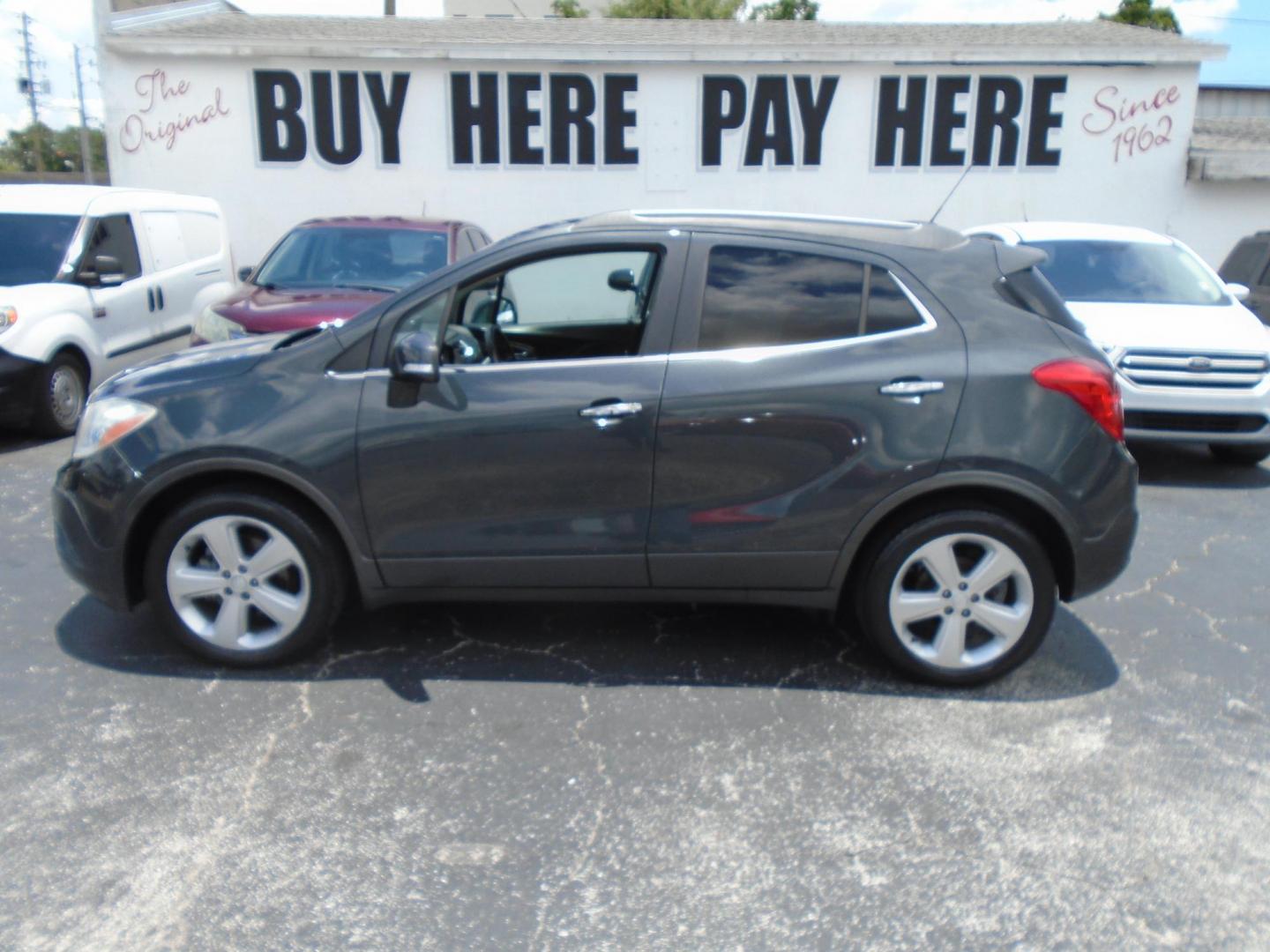 2016 Buick Encore Base FWD (KL4CJASB2GB) with an 1.4L L4 DOHC 16V TURBO engine, 6A transmission, located at 6112 N Florida Avenue, Tampa, FL, 33604, (888) 521-5131, 27.954929, -82.459534 - Photo#0