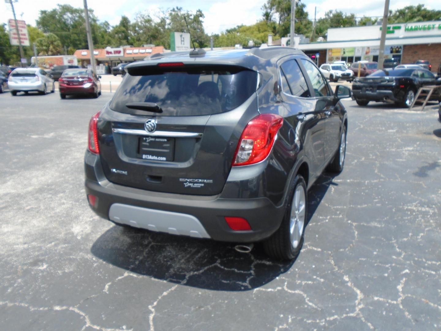 2016 Buick Encore Base FWD (KL4CJASB2GB) with an 1.4L L4 DOHC 16V TURBO engine, 6A transmission, located at 6112 N Florida Avenue, Tampa, FL, 33604, (888) 521-5131, 27.954929, -82.459534 - Photo#4