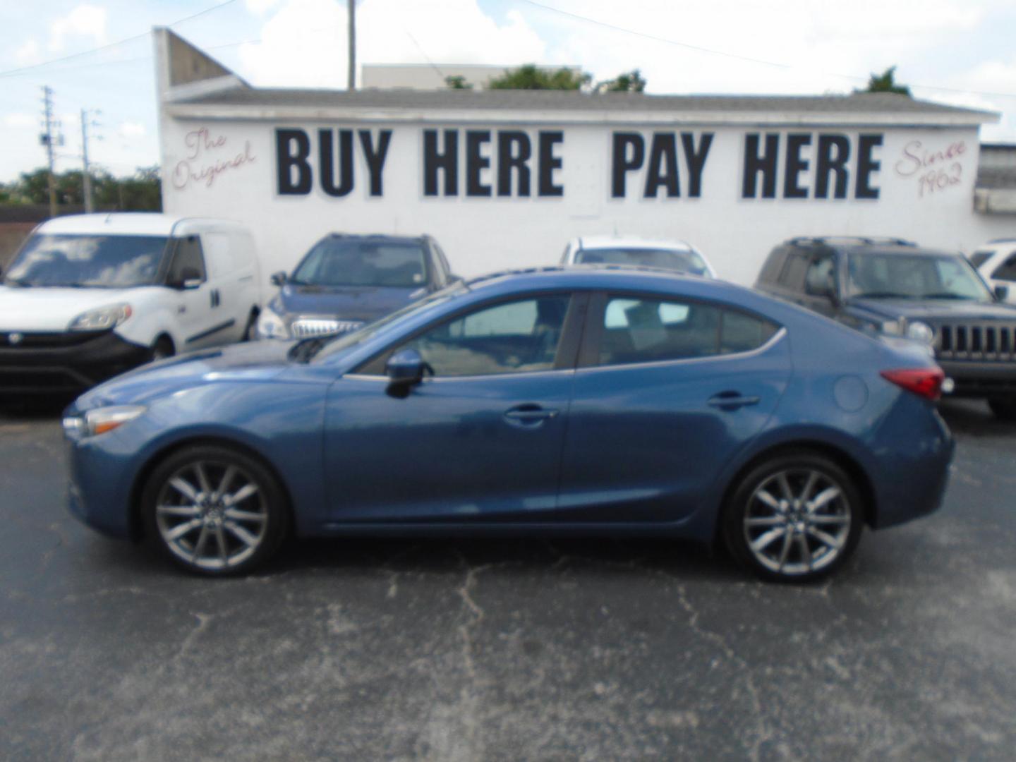 2018 Mazda MAZDA3 s Touring AT 4-Door (3MZBN1V36JM) with an 2.5L L4 DOHC 16V engine, 6A transmission, located at 6112 N Florida Avenue, Tampa, FL, 33604, (888) 521-5131, 27.954929, -82.459534 - Photo#0