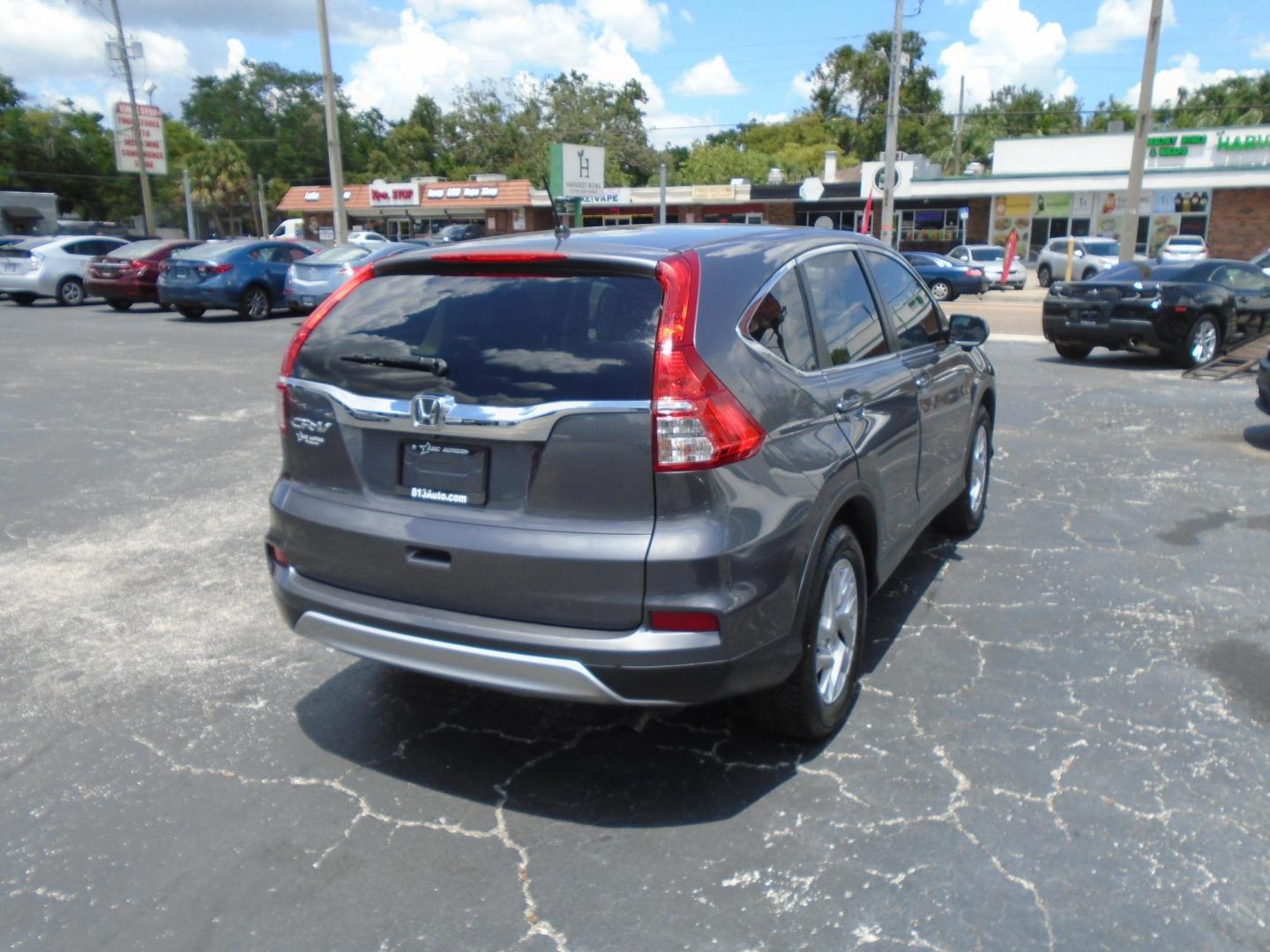 2016 Honda CR-V EX 2WD (3CZRM3H5XGG) with an 2.4L L4 DOHC 16V engine, CVT transmission, located at 6112 N Florida Avenue, Tampa, FL, 33604, (888) 521-5131, 27.954929, -82.459534 - Photo#4