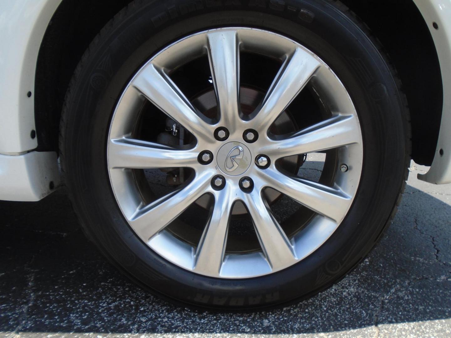 2012 Infiniti QX56 2WD (JN8AZ2NF5C9) with an 5.6L V8 DOHC 32V engine, 5-Speed Automatic transmission, located at 6112 N Florida Avenue, Tampa, FL, 33604, (888) 521-5131, 27.954929, -82.459534 - Photo#7