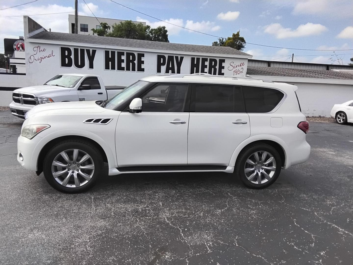 2012 White /Black Infiniti QX56 2WD (JN8AZ2NF5C9) with an 5.6L V8 DOHC 32V engine, 5-Speed Automatic transmission, located at 6112 N Florida Avenue, Tampa, FL, 33604, (888) 521-5131, 27.954929, -82.459534 - $499 down plus tax & tag. - Photo#0