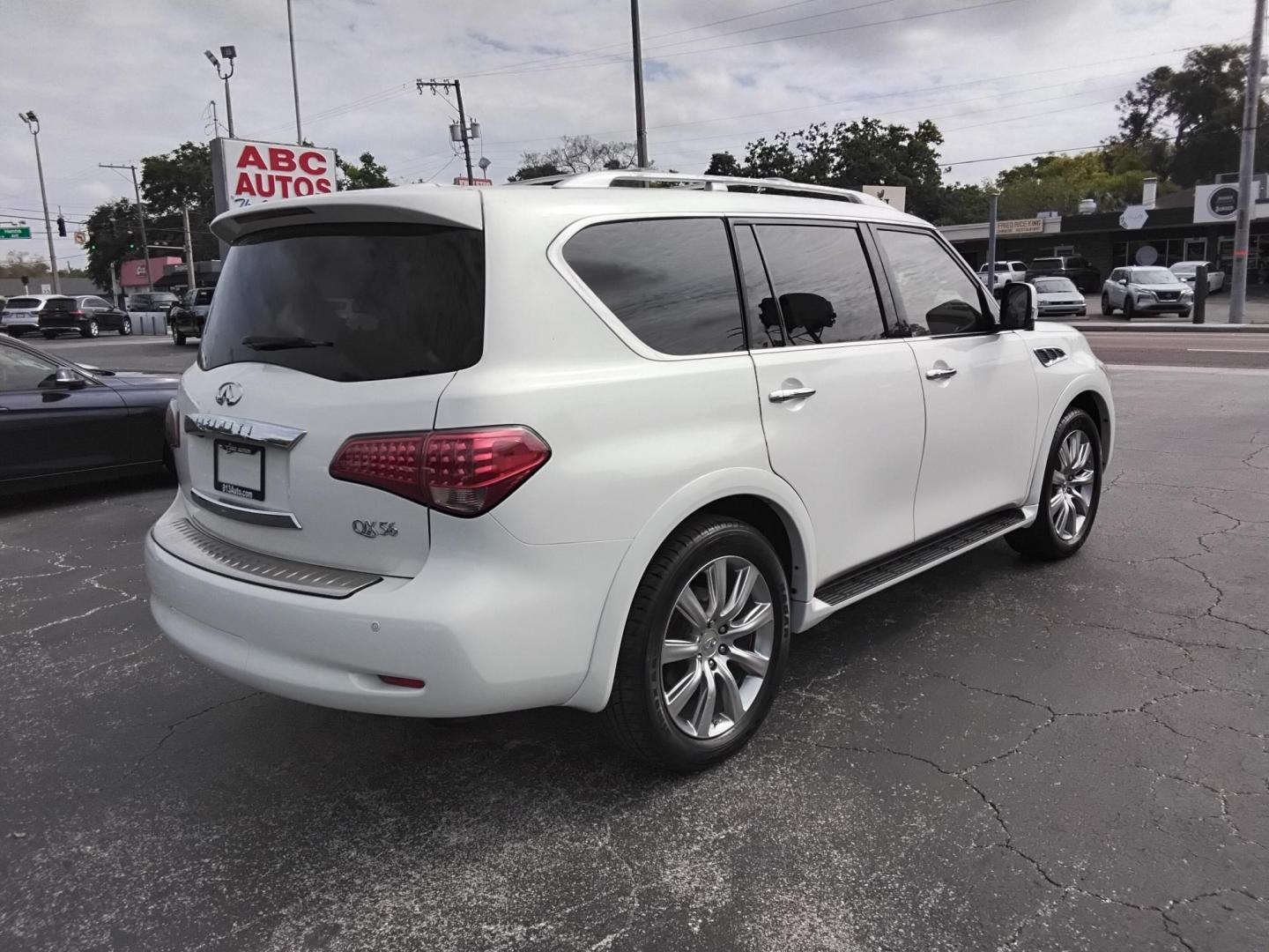 2012 White /Black Infiniti QX56 2WD (JN8AZ2NF5C9) with an 5.6L V8 DOHC 32V engine, 5-Speed Automatic transmission, located at 6112 N Florida Avenue, Tampa, FL, 33604, (888) 521-5131, 27.954929, -82.459534 - $499 down plus tax & tag. - Photo#9