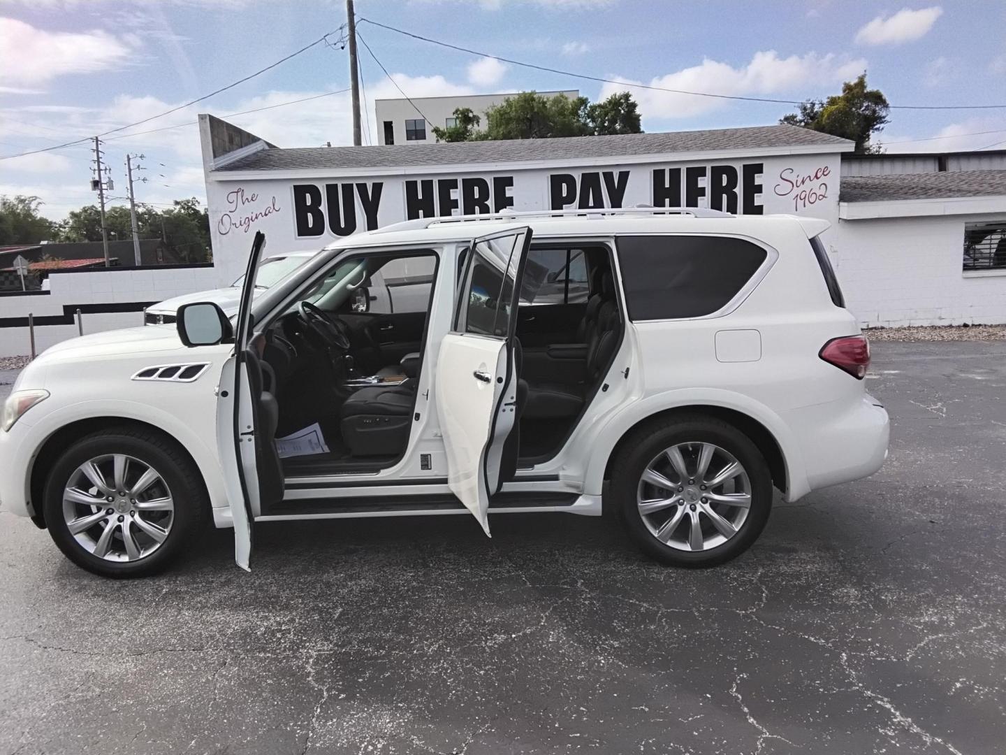 2012 White /Black Infiniti QX56 2WD (JN8AZ2NF5C9) with an 5.6L V8 DOHC 32V engine, 5-Speed Automatic transmission, located at 6112 N Florida Avenue, Tampa, FL, 33604, (888) 521-5131, 27.954929, -82.459534 - $499 down plus tax & tag. - Photo#1