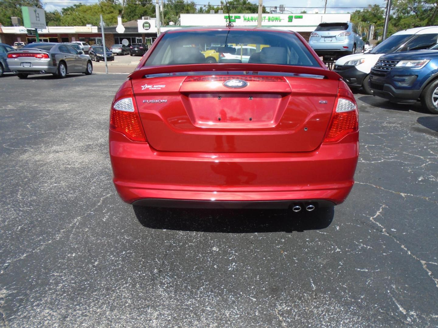 2011 Ford Fusion I4 SE (3FAHP0HA6BR) with an 2.5L L4 DOHC 16V engine, located at 6112 N Florida Avenue, Tampa, FL, 33604, (888) 521-5131, 27.954929, -82.459534 - Photo#2