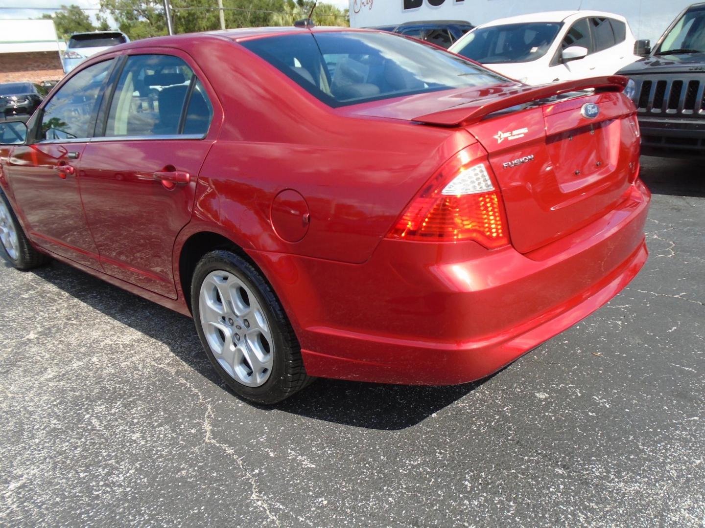 2011 Ford Fusion I4 SE (3FAHP0HA6BR) with an 2.5L L4 DOHC 16V engine, located at 6112 N Florida Avenue, Tampa, FL, 33604, (888) 521-5131, 27.954929, -82.459534 - Photo#4