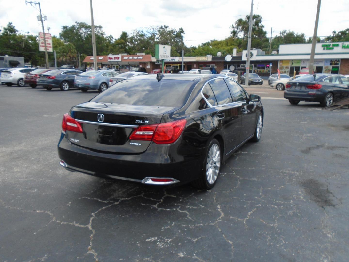 2014 BLACK /GREY Acura RLX 6-Spd AT w/Advance Package (JH4KC1F91EC) with an 3.5L V6 SOHC 24V engine, 6-Speed Automatic transmission, located at 6112 N Florida Avenue, Tampa, FL, 33604, (888) 521-5131, 27.954929, -82.459534 - 499 DOWN PLUS TAX TAG FEE!!!! - Photo#1