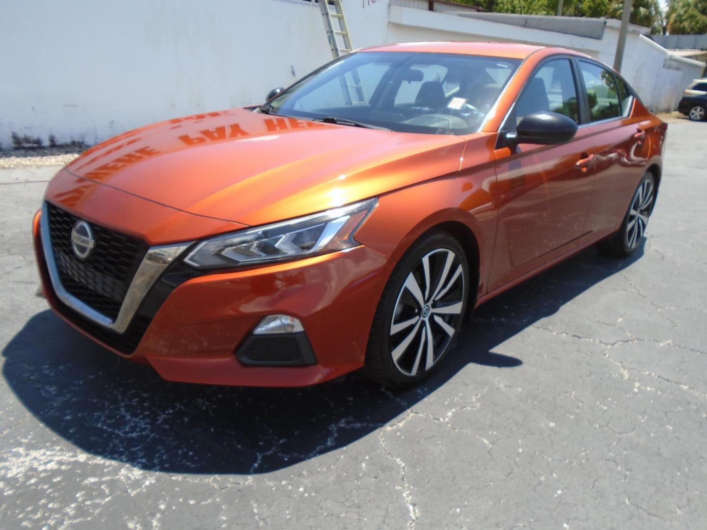2019 orange /grey Nissan Altima 2.5 SR (1N4BL4CV6KC) with an 2.5L L4 DOHC 16V engine, CVT transmission, located at 6112 N Florida Avenue, Tampa, FL, 33604, (888) 521-5131, 27.954929, -82.459534 - 499 down plus tax & tag!!! - Photo#2