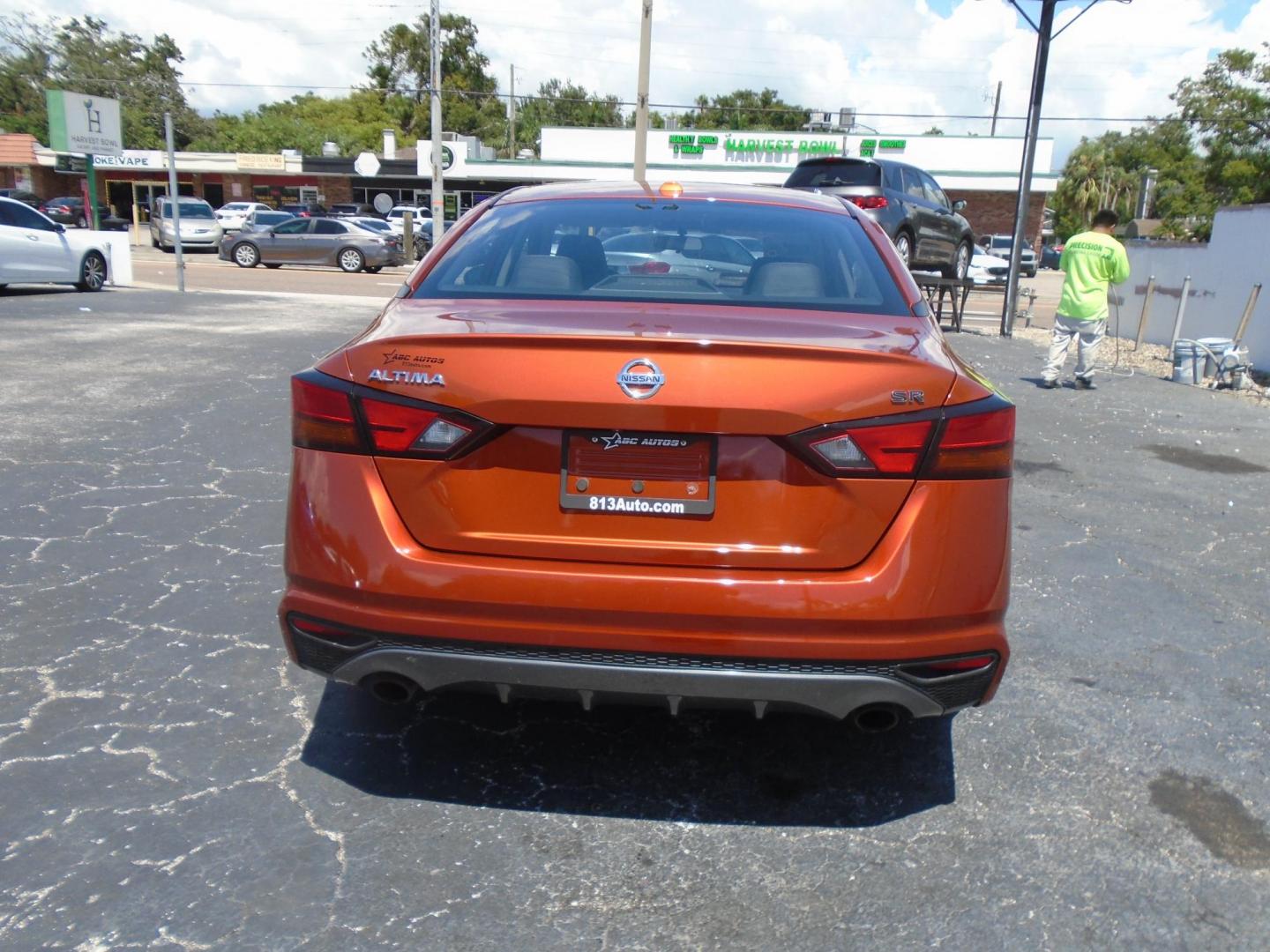 2019 orange /grey Nissan Altima 2.5 SR (1N4BL4CV6KC) with an 2.5L L4 DOHC 16V engine, CVT transmission, located at 6112 N Florida Avenue, Tampa, FL, 33604, (888) 521-5131, 27.954929, -82.459534 - 499 down plus tax & tag!!! - Photo#4