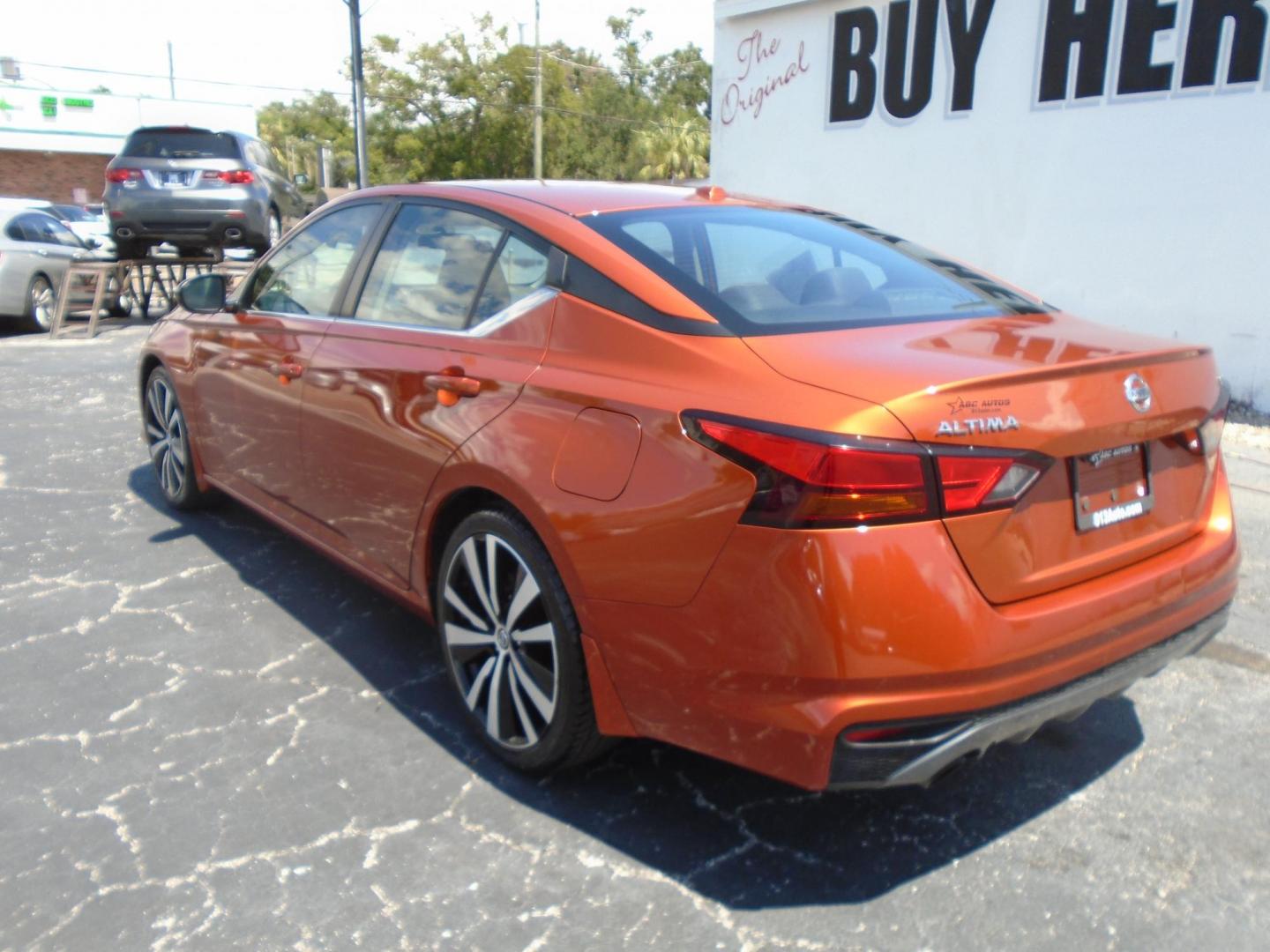2019 orange /grey Nissan Altima 2.5 SR (1N4BL4CV6KC) with an 2.5L L4 DOHC 16V engine, CVT transmission, located at 6112 N Florida Avenue, Tampa, FL, 33604, (888) 521-5131, 27.954929, -82.459534 - 499 down plus tax & tag!!! - Photo#6