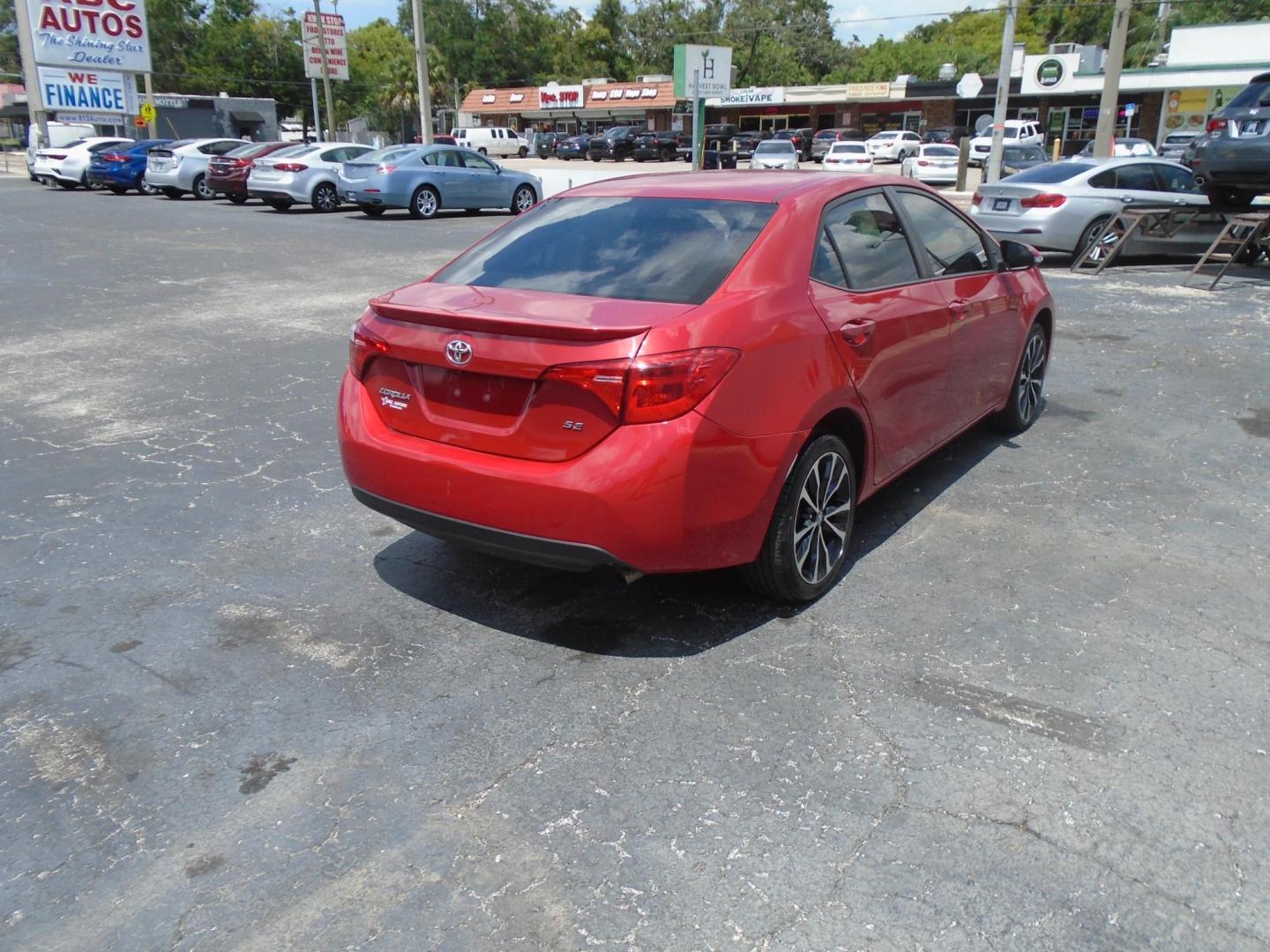 2017 RED /BLACK Toyota Corolla SE CVT (5YFBURHE4HP) with an 1.8L L4 DOHC 16V engine, CVT transmission, located at 6112 N Florida Avenue, Tampa, FL, 33604, (888) 521-5131, 27.954929, -82.459534 - 499 DOWN PLUS TAX & TAG - Photo#5