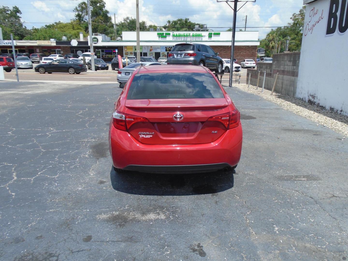 2017 RED /BLACK Toyota Corolla SE CVT (5YFBURHE4HP) with an 1.8L L4 DOHC 16V engine, CVT transmission, located at 6112 N Florida Avenue, Tampa, FL, 33604, (888) 521-5131, 27.954929, -82.459534 - 499 DOWN PLUS TAX & TAG - Photo#4