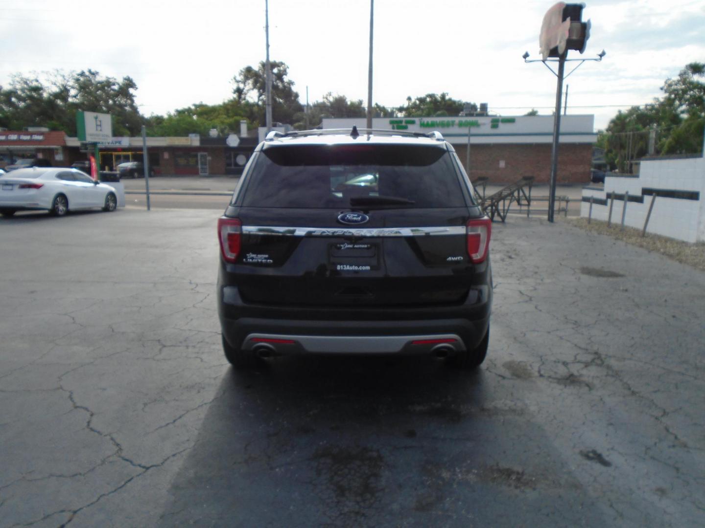 2017 BLACK /Black Ford Explorer Limited 4WD (1FM5K8F84HG) with an 3.5L V6 DOHC 24V engine, 6A transmission, located at 6112 N Florida Avenue, Tampa, FL, 33604, (888) 521-5131, 27.954929, -82.459534 - 499 DOWN PLUS TAX & TAG. - Photo#4