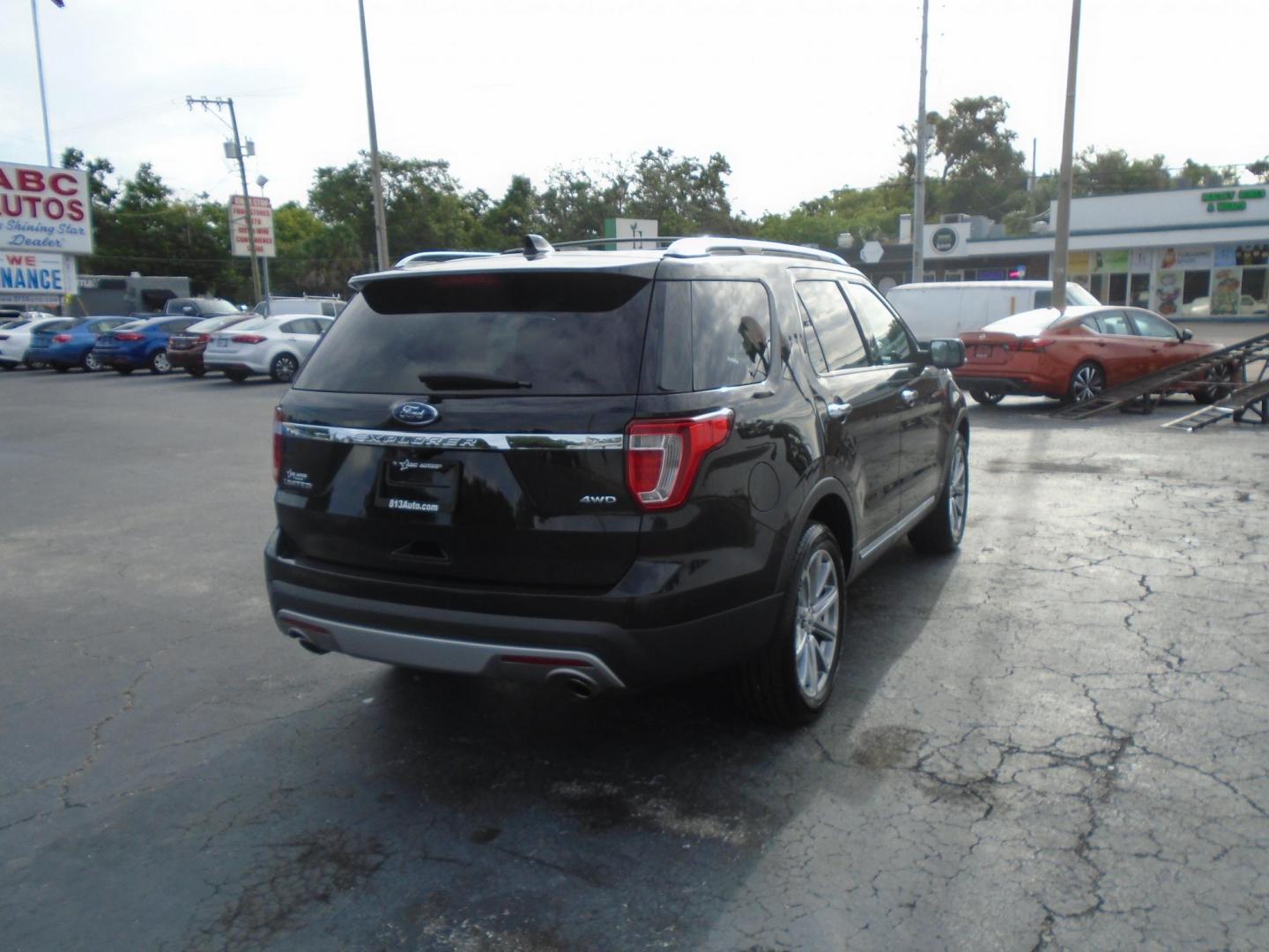 2017 BLACK /Black Ford Explorer Limited 4WD (1FM5K8F84HG) with an 3.5L V6 DOHC 24V engine, 6A transmission, located at 6112 N Florida Avenue, Tampa, FL, 33604, (888) 521-5131, 27.954929, -82.459534 - 499 DOWN PLUS TAX & TAG. - Photo#5