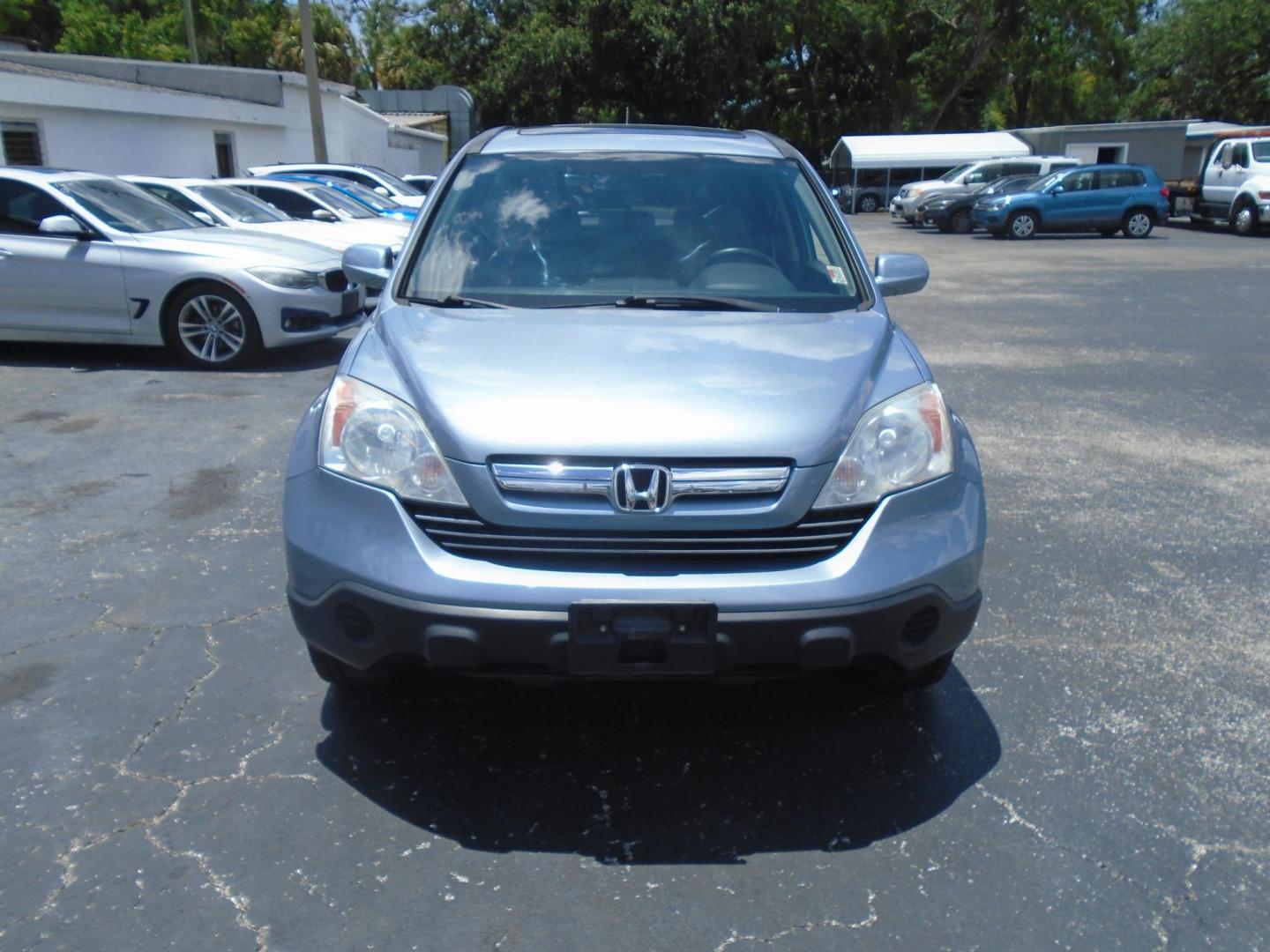 2009 LT BLUE /Beige Honda CR-V EX-L 2WD 5-Speed AT (5J6RE38789L) with an 2.4L L4 DOHC 16V engine, 5-Speed Automatic Overdrive transmission, located at 6112 N Florida Avenue, Tampa, FL, 33604, (888) 521-5131, 27.954929, -82.459534 - 499 DOWN PLUS TAX & TAG - Photo#1
