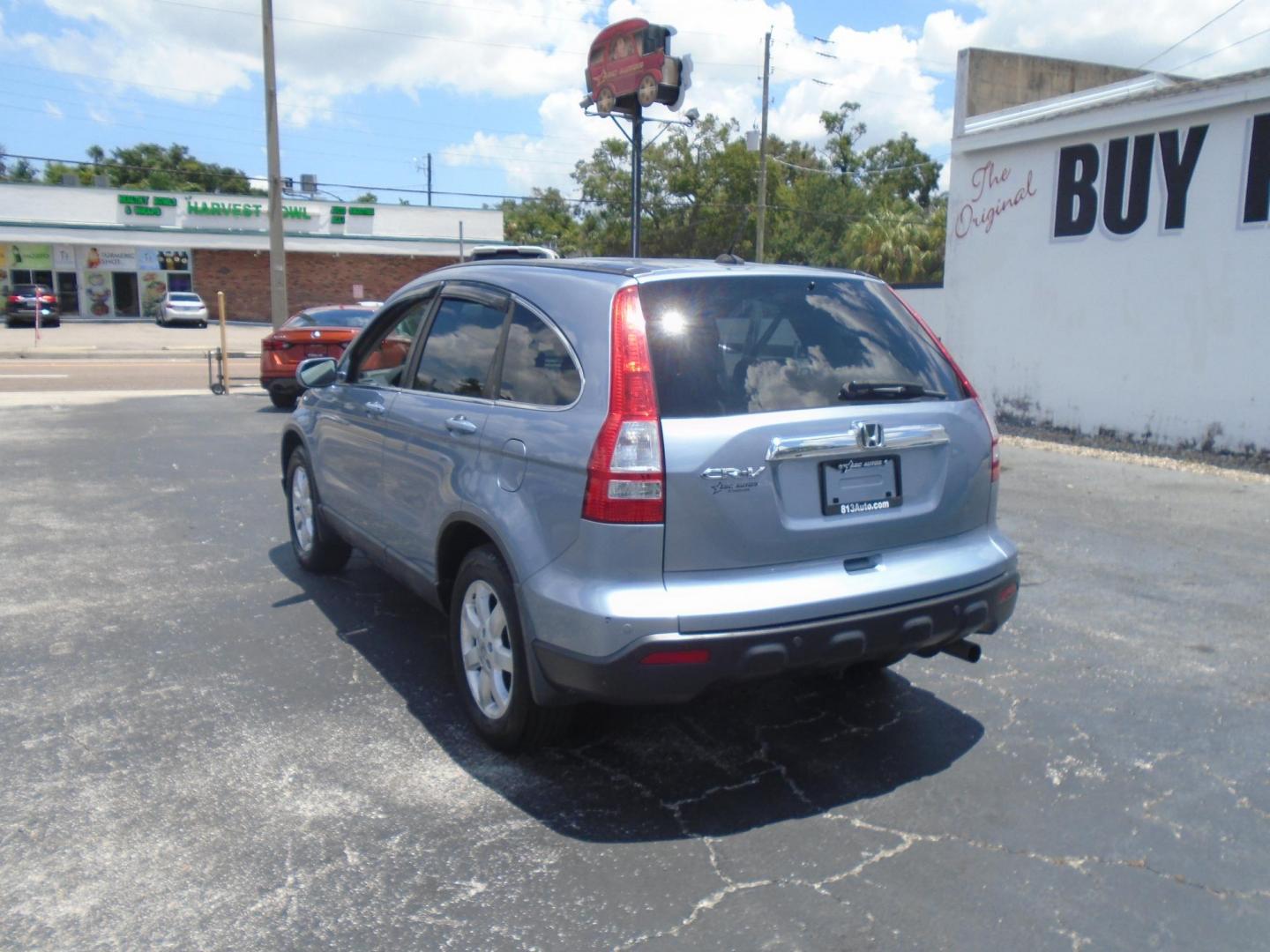 2009 LT BLUE /Beige Honda CR-V EX-L 2WD 5-Speed AT (5J6RE38789L) with an 2.4L L4 DOHC 16V engine, 5-Speed Automatic Overdrive transmission, located at 6112 N Florida Avenue, Tampa, FL, 33604, (888) 521-5131, 27.954929, -82.459534 - 499 DOWN PLUS TAX & TAG - Photo#5