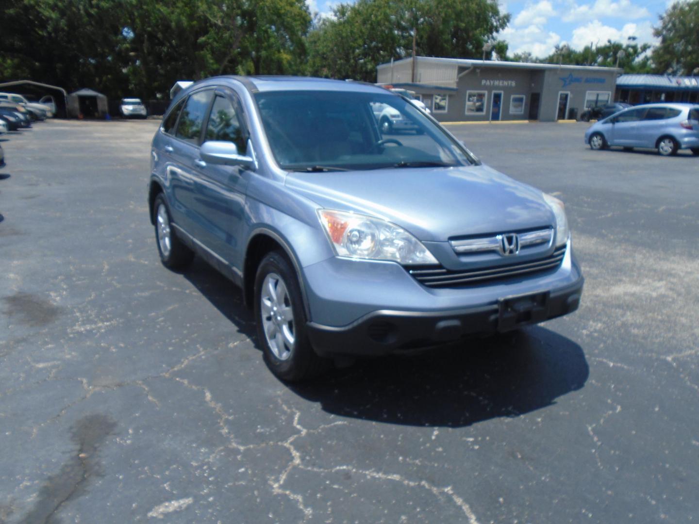 2009 LT BLUE /Beige Honda CR-V EX-L 2WD 5-Speed AT (5J6RE38789L) with an 2.4L L4 DOHC 16V engine, 5-Speed Automatic Overdrive transmission, located at 6112 N Florida Avenue, Tampa, FL, 33604, (888) 521-5131, 27.954929, -82.459534 - 499 DOWN PLUS TAX & TAG - Photo#3