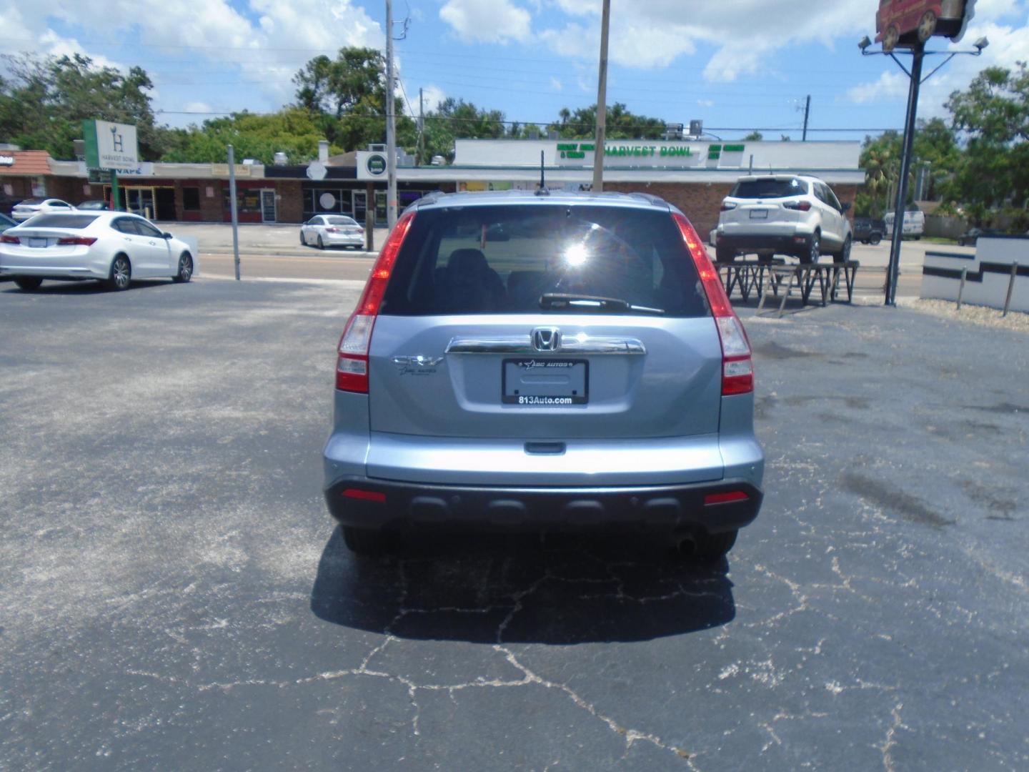 2009 LT BLUE /Beige Honda CR-V EX-L 2WD 5-Speed AT (5J6RE38789L) with an 2.4L L4 DOHC 16V engine, 5-Speed Automatic Overdrive transmission, located at 6112 N Florida Avenue, Tampa, FL, 33604, (888) 521-5131, 27.954929, -82.459534 - 499 DOWN PLUS TAX & TAG - Photo#4