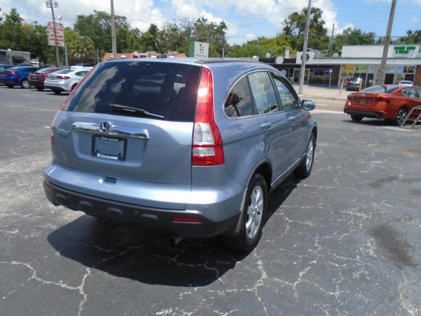 2009 LT BLUE /Beige Honda CR-V EX-L 2WD 5-Speed AT (5J6RE38789L) with an 2.4L L4 DOHC 16V engine, 5-Speed Automatic Overdrive transmission, located at 6112 N Florida Avenue, Tampa, FL, 33604, (888) 521-5131, 27.954929, -82.459534 - 499 DOWN PLUS TAX & TAG - Photo#6