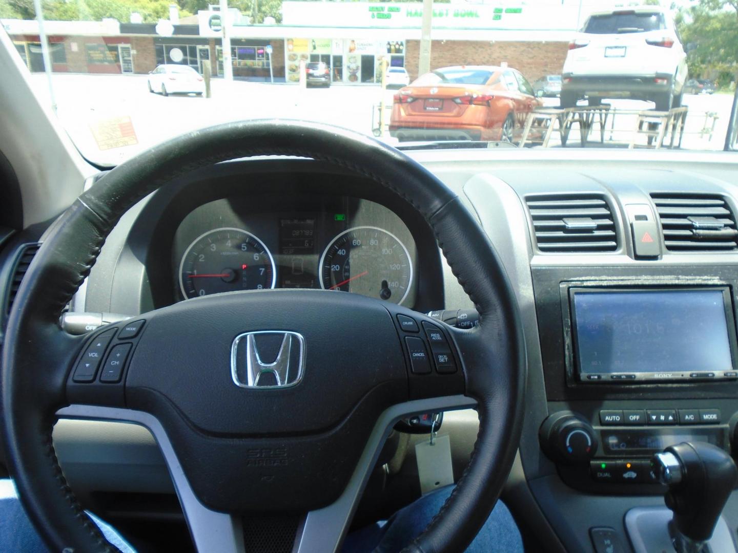2009 LT BLUE /Beige Honda CR-V EX-L 2WD 5-Speed AT (5J6RE38789L) with an 2.4L L4 DOHC 16V engine, 5-Speed Automatic Overdrive transmission, located at 6112 N Florida Avenue, Tampa, FL, 33604, (888) 521-5131, 27.954929, -82.459534 - 499 DOWN PLUS TAX & TAG - Photo#13