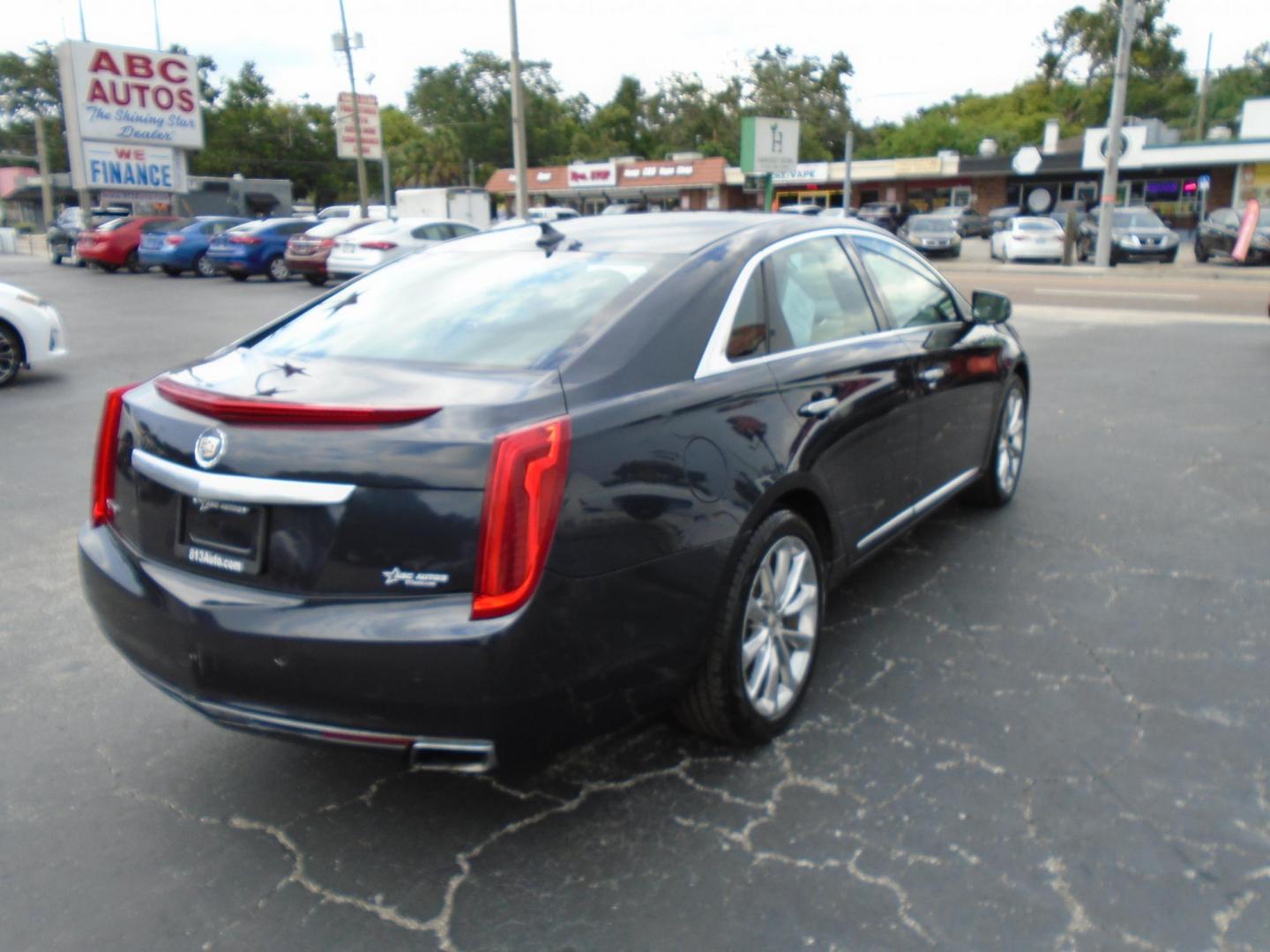 2014 BLUE /Beige Cadillac XTS Luxury FWD (2G61M5S39E9) with an 3.6L V6 DOHC 24V engine, 6-Speed Automatic transmission, located at 6112 N Florida Avenue, Tampa, FL, 33604, (888) 521-5131, 27.954929, -82.459534 - 499 DOWN PLUS TAX & TAG. - Photo#6