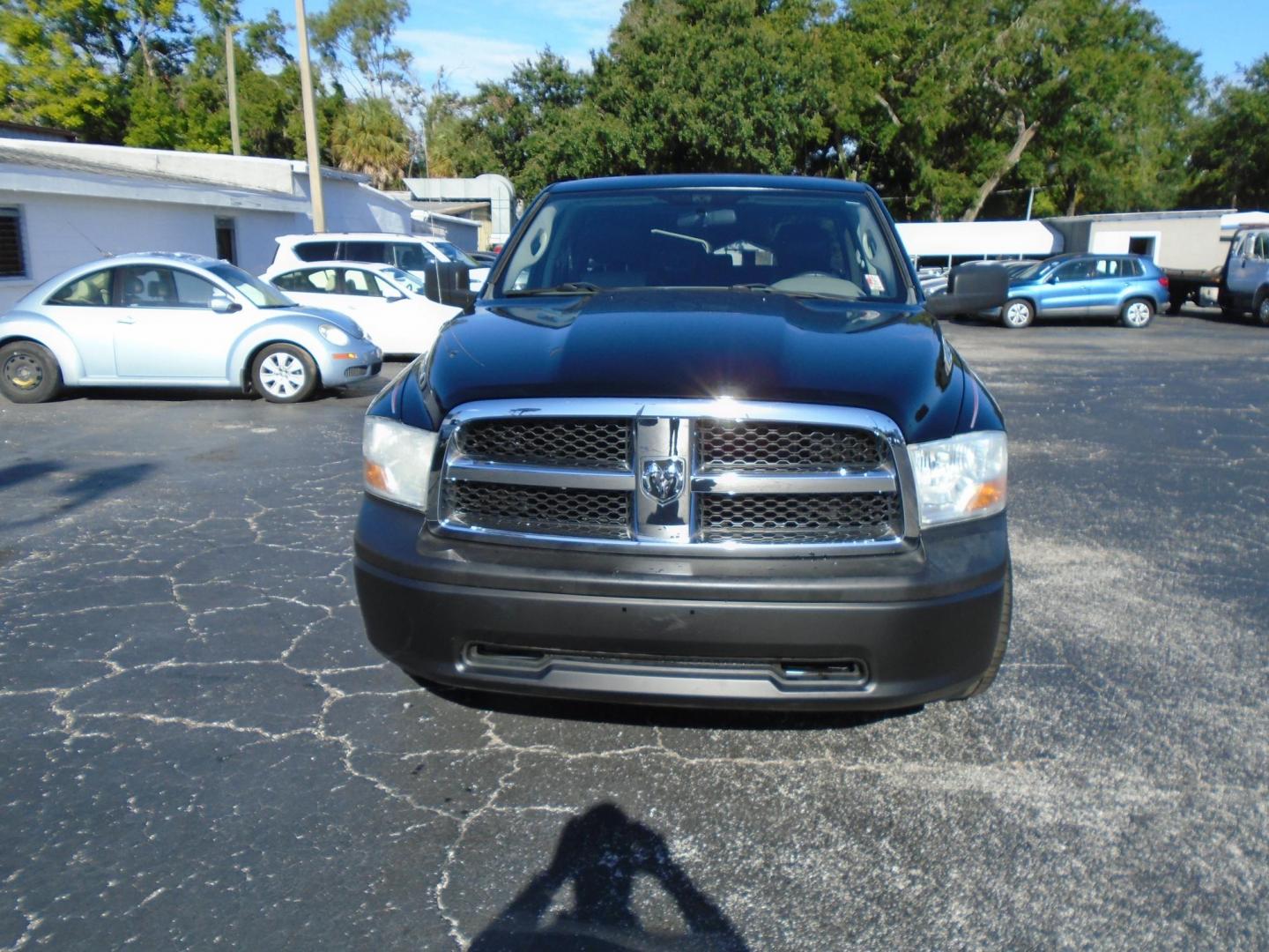 2012 BLACK /Grey Dodge Ram 1500 ST Quad Cab 2WD (1C6RD6FK0CS) with an 3.7L V6 SOHC 12V engine, 6-Speed Automatic transmission, located at 6112 N Florida Avenue, Tampa, FL, 33604, (888) 521-5131, 27.954929, -82.459534 - 499 DOWN PLUS TAX &TAG - Photo#1