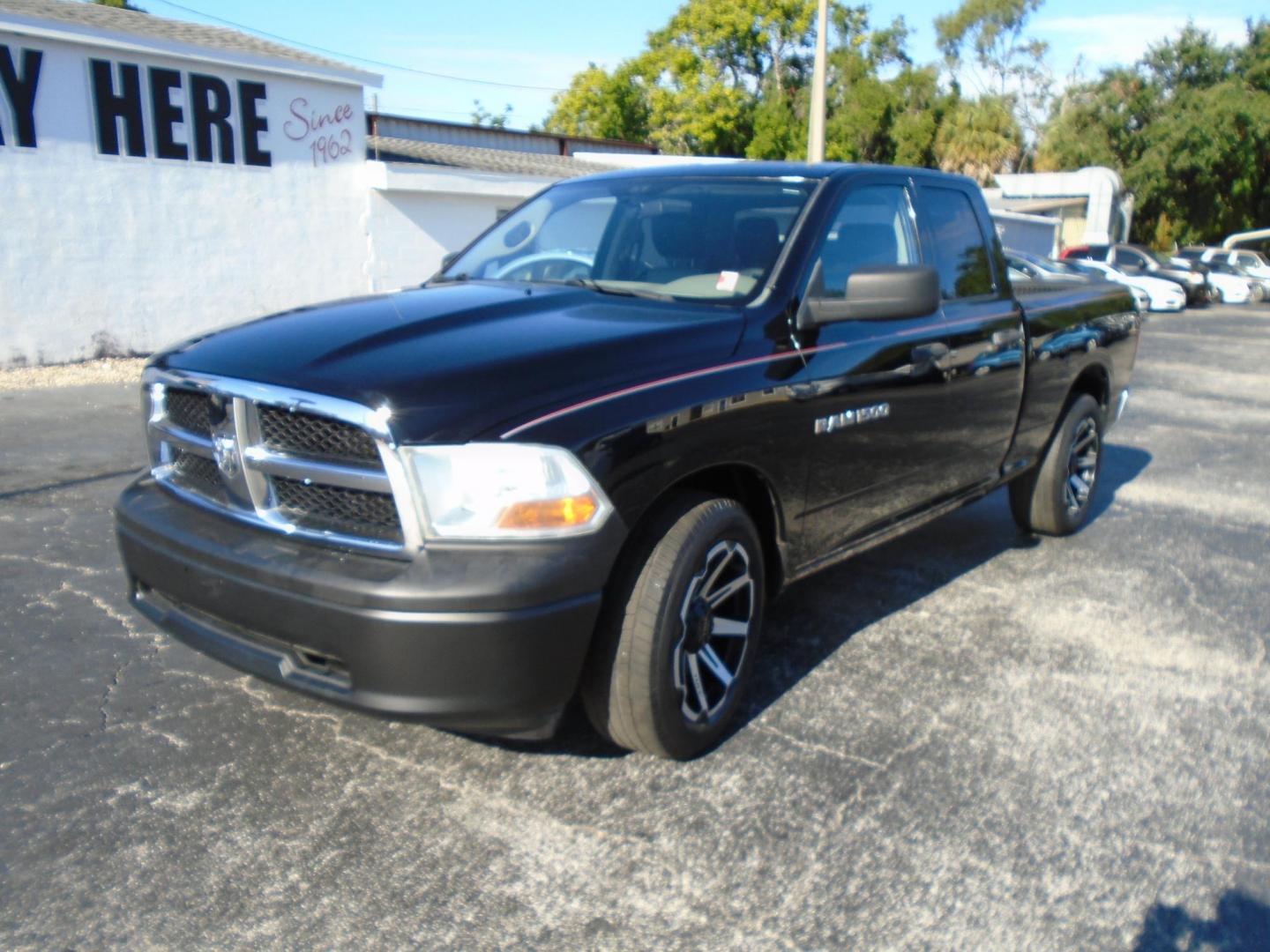 2012 BLACK /Grey Dodge Ram 1500 ST Quad Cab 2WD (1C6RD6FK0CS) with an 3.7L V6 SOHC 12V engine, 6-Speed Automatic transmission, located at 6112 N Florida Avenue, Tampa, FL, 33604, (888) 521-5131, 27.954929, -82.459534 - 499 DOWN PLUS TAX &TAG - Photo#2