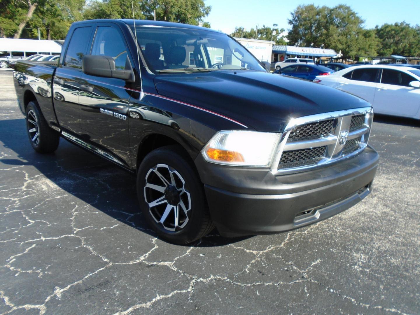 2012 BLACK /Grey Dodge Ram 1500 ST Quad Cab 2WD (1C6RD6FK0CS) with an 3.7L V6 SOHC 12V engine, 6-Speed Automatic transmission, located at 6112 N Florida Avenue, Tampa, FL, 33604, (888) 521-5131, 27.954929, -82.459534 - 499 DOWN PLUS TAX &TAG - Photo#3