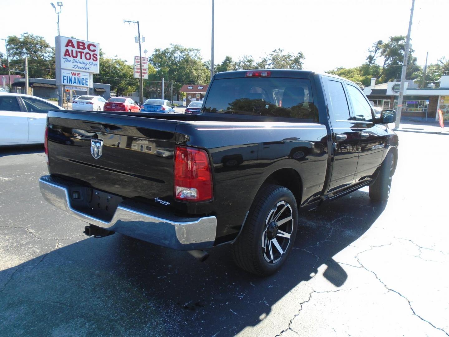 2012 BLACK /Grey Dodge Ram 1500 ST Quad Cab 2WD (1C6RD6FK0CS) with an 3.7L V6 SOHC 12V engine, 6-Speed Automatic transmission, located at 6112 N Florida Avenue, Tampa, FL, 33604, (888) 521-5131, 27.954929, -82.459534 - 499 DOWN PLUS TAX &TAG - Photo#5