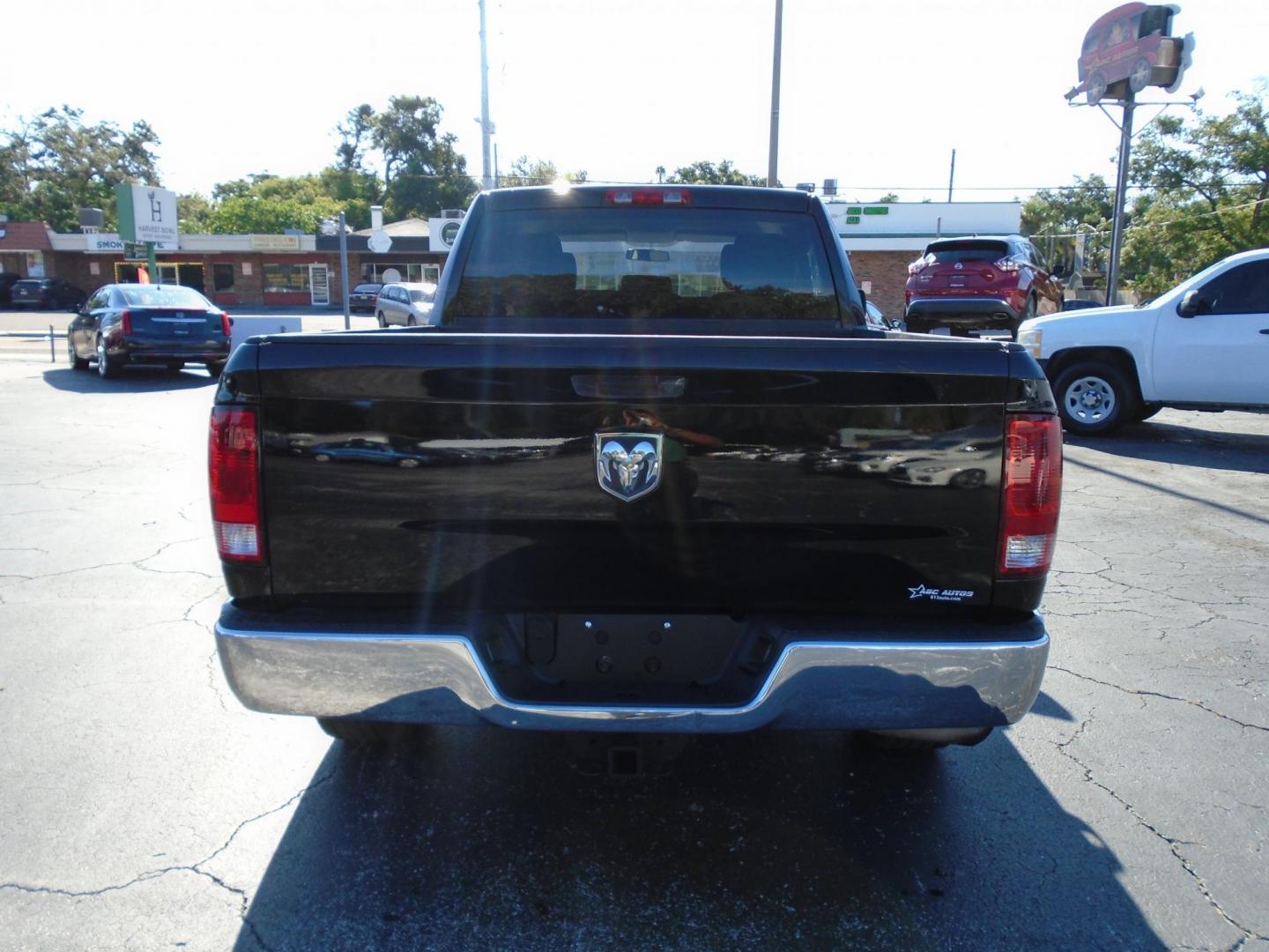 2012 BLACK /Grey Dodge Ram 1500 ST Quad Cab 2WD (1C6RD6FK0CS) with an 3.7L V6 SOHC 12V engine, 6-Speed Automatic transmission, located at 6112 N Florida Avenue, Tampa, FL, 33604, (888) 521-5131, 27.954929, -82.459534 - 499 DOWN PLUS TAX &TAG - Photo#4