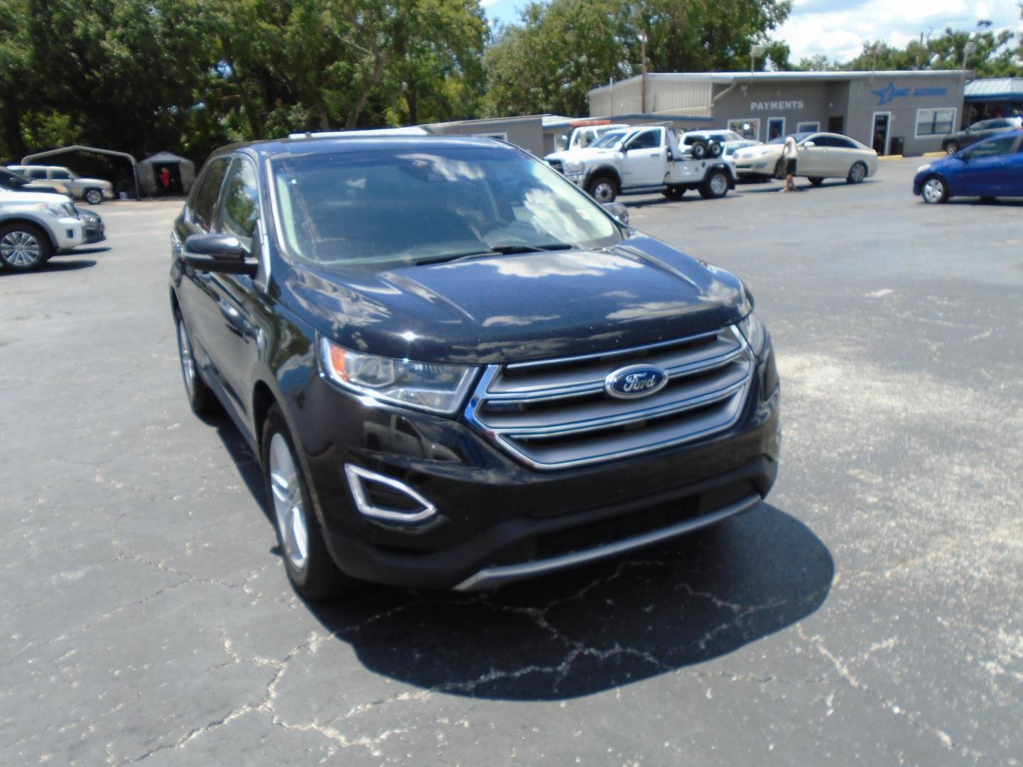 2018 BLACK /Grey Ford Edge SEL FWD (2FMPK3J94JB) with an 2.0L L4 DOHC 16V engine, 6A transmission, located at 6112 N Florida Avenue, Tampa, FL, 33604, (888) 521-5131, 27.954929, -82.459534 - 499 DOWN PLUS TAX & TAG - Photo#2