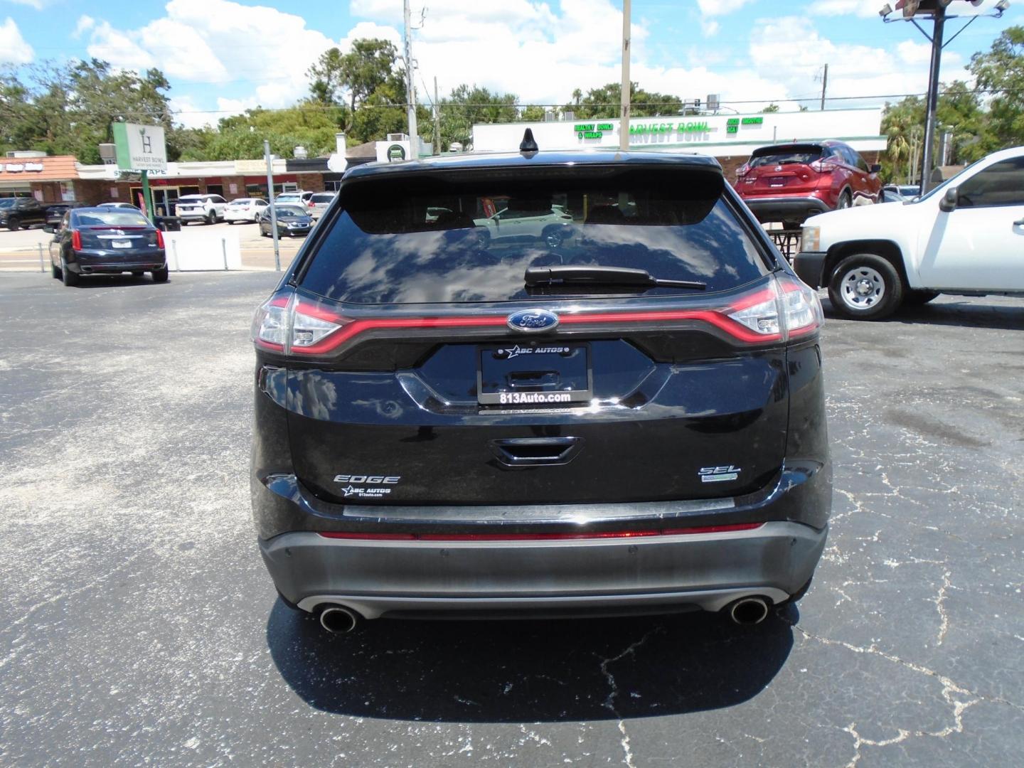 2018 BLACK /Grey Ford Edge SEL FWD (2FMPK3J94JB) with an 2.0L L4 DOHC 16V engine, 6A transmission, located at 6112 N Florida Avenue, Tampa, FL, 33604, (888) 521-5131, 27.954929, -82.459534 - 499 DOWN PLUS TAX & TAG - Photo#4