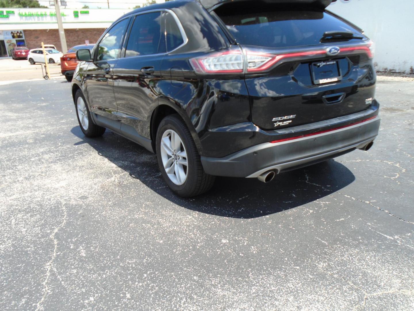 2018 BLACK /Grey Ford Edge SEL FWD (2FMPK3J94JB) with an 2.0L L4 DOHC 16V engine, 6A transmission, located at 6112 N Florida Avenue, Tampa, FL, 33604, (888) 521-5131, 27.954929, -82.459534 - 499 DOWN PLUS TAX & TAG - Photo#6